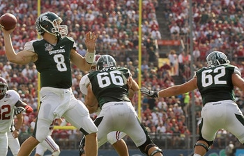 ORLANDO, FL - JANUARY 01:  Kirk Cousins #8 of the Michigan State Spartans passes the ball during the Capitol One Bowl against the Alabama Crimson Tide at the Florida Citrus Bowl on January 1, 2011 in Orlando, Florida.  (Photo by Mike Ehrmann/Getty Images)