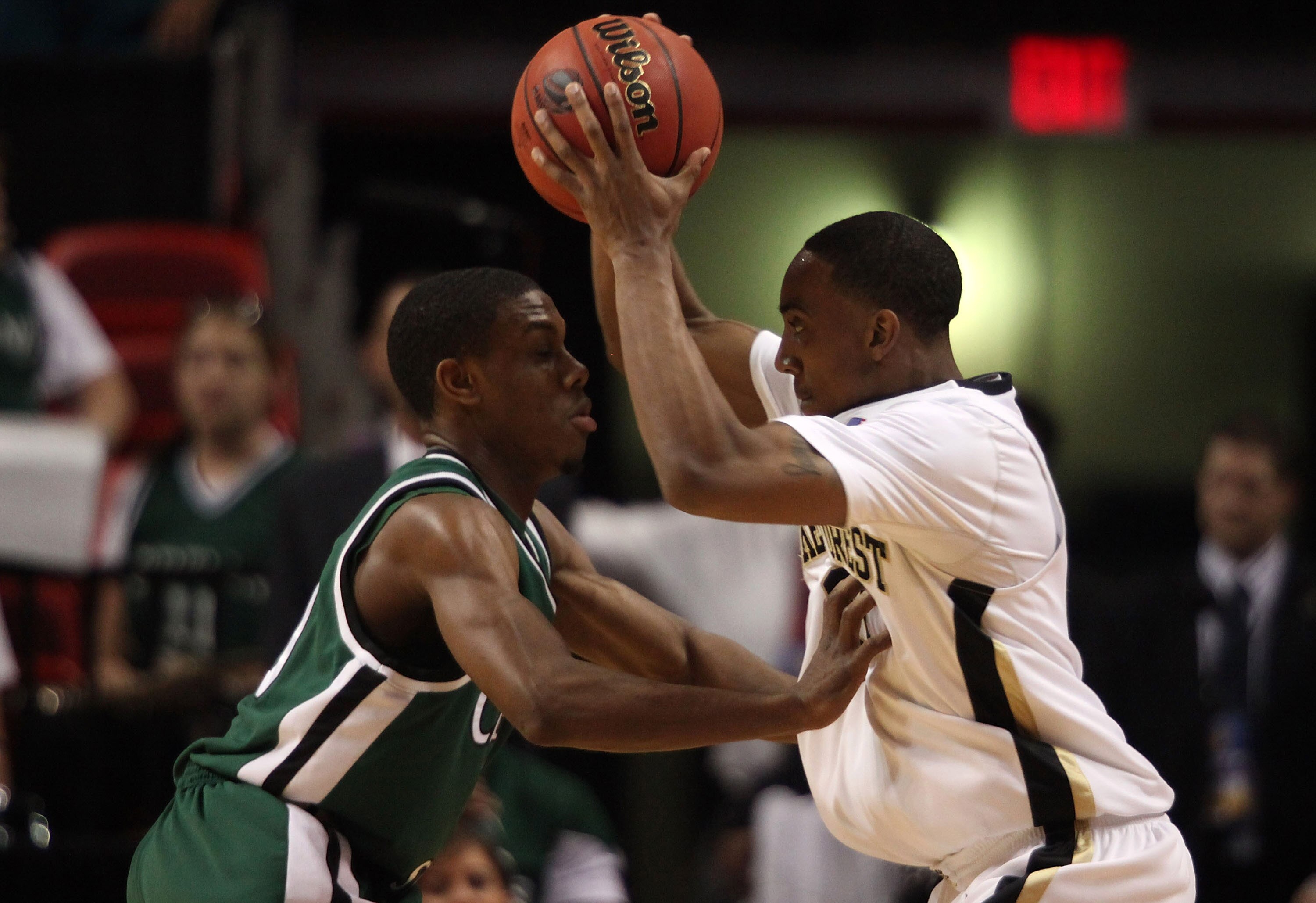 MIAMI - MARCH 20: Guard Jeff Teague #0 (R) of the Wake Forest Demon Deacons is defended by guard Norris Cole #30 (L) of the Cleveland State University Vikings during the first round of the NCAA Division I Men's Basketball Tournament at the American Airlin MIAMI - MARCH 20: Guard Jeff Teague #0 (R) of the Wake Forest Demon Deacons is defended by guard Norris Cole #30 (L) of the Cleveland State University Vikings during the first round of the NCAA Division I Men's Basketball Tournament at the American Airlin