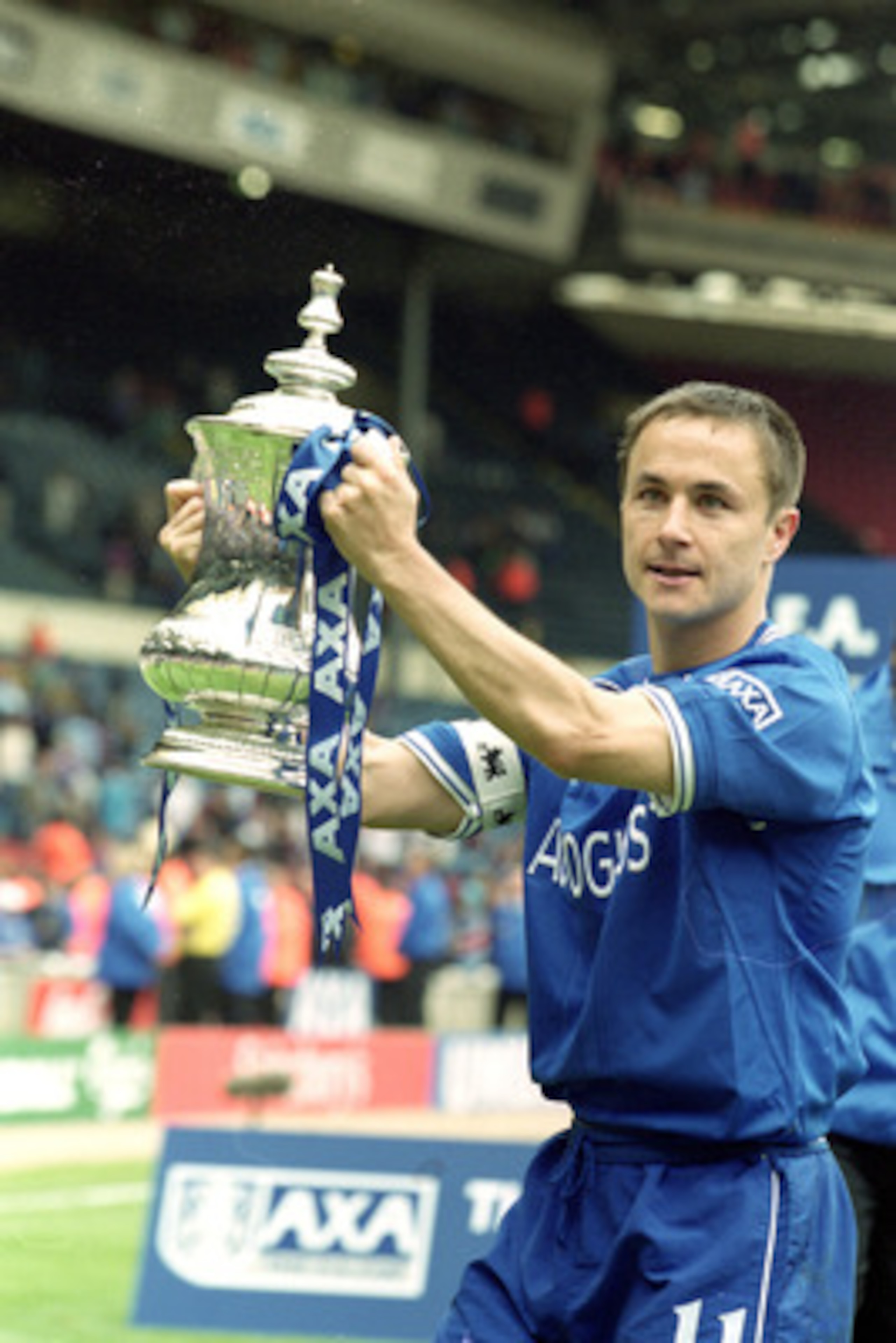 20 May 2000: Chelsea Captain Dennis Wise displays the trophy as Chelsea beat Aston Villa in the AXA FA Cup Final at Wembley Stadium in London, England. Chelsea won 1 - 0. \ Mandatory Credit: Ben Radford /Allsport 20 May 2000: Chelsea Captain Dennis Wise displays the trophy as Chelsea beat Aston Villa in the AXA FA Cup Final at Wembley Stadium in London, England. Chelsea won 1 - 0. \ Mandatory Credit: Ben Radford /Allsport