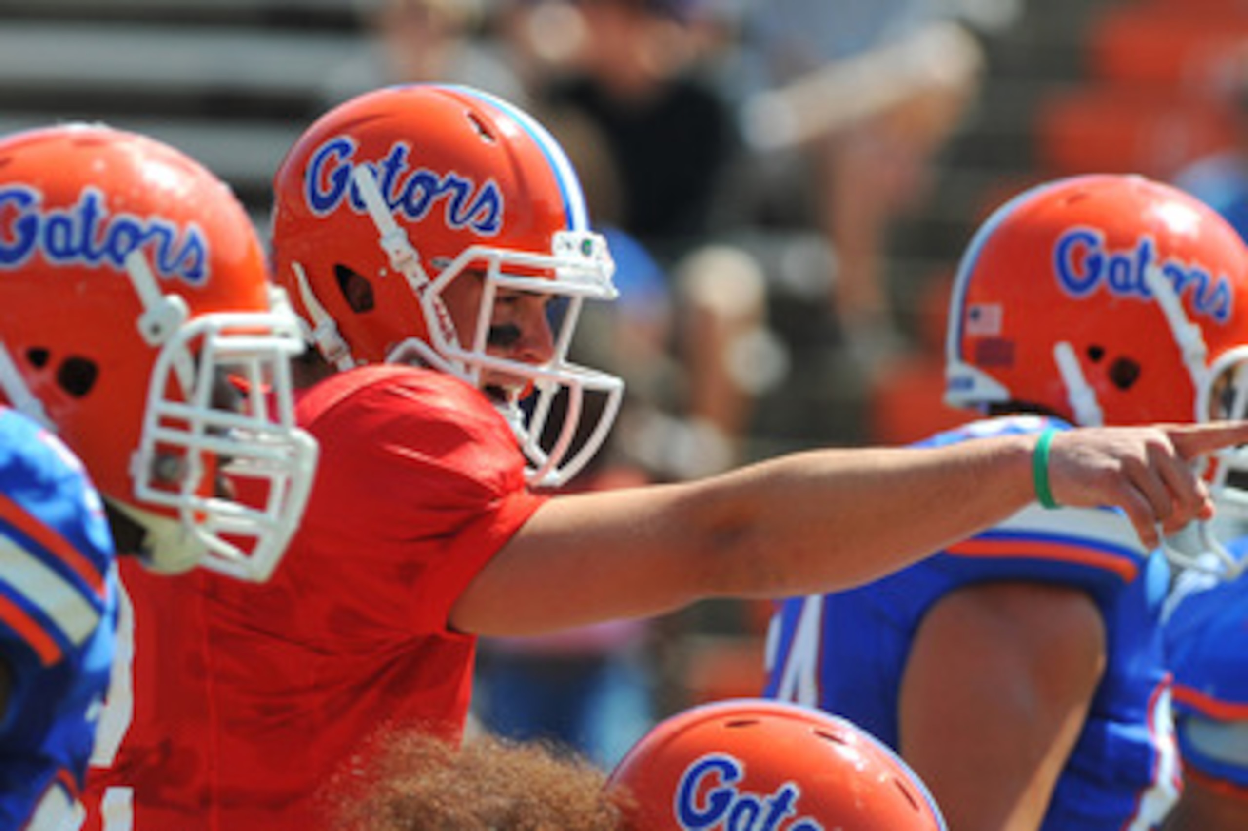 GAINESVILLE, FL - APRIL 9:  Quarterback John Brantley #12 of the Florida Gators directs play the Orange and Blue spring football game April 9, 2011 at Ben Hill Griffin Stadium in Gainesville, Florida.  (Photo by Al Messerschmidt/Getty Images)
