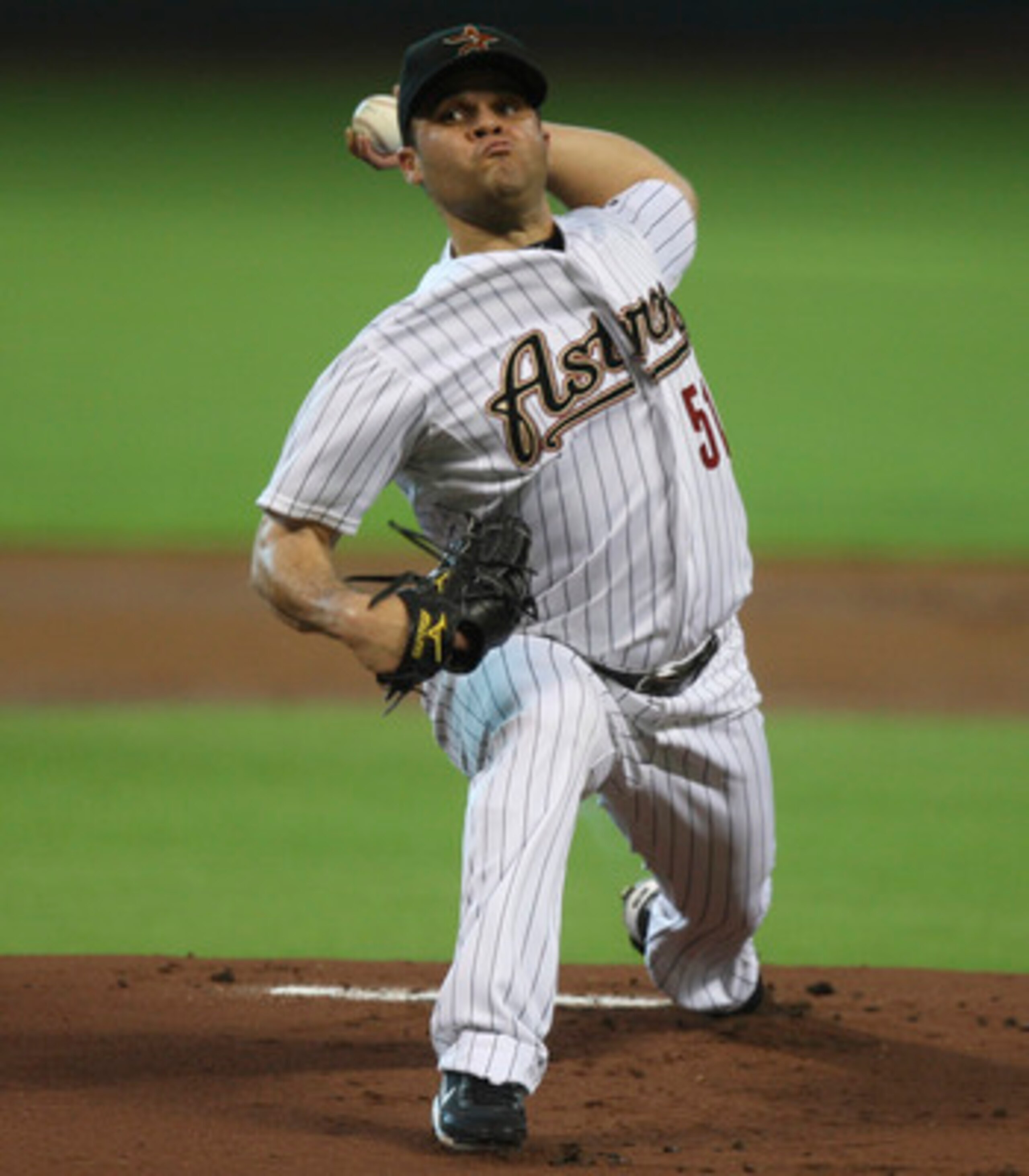 HOUSTON - JUNE 13:  Pitcher Wandy Rodriguez #51 of the Houston Astros throws against the Atlanta Braves at Minute Maid Park on June 13, 2011 in Houston, Texas.  (Photo by Bob Levey/Getty Images)