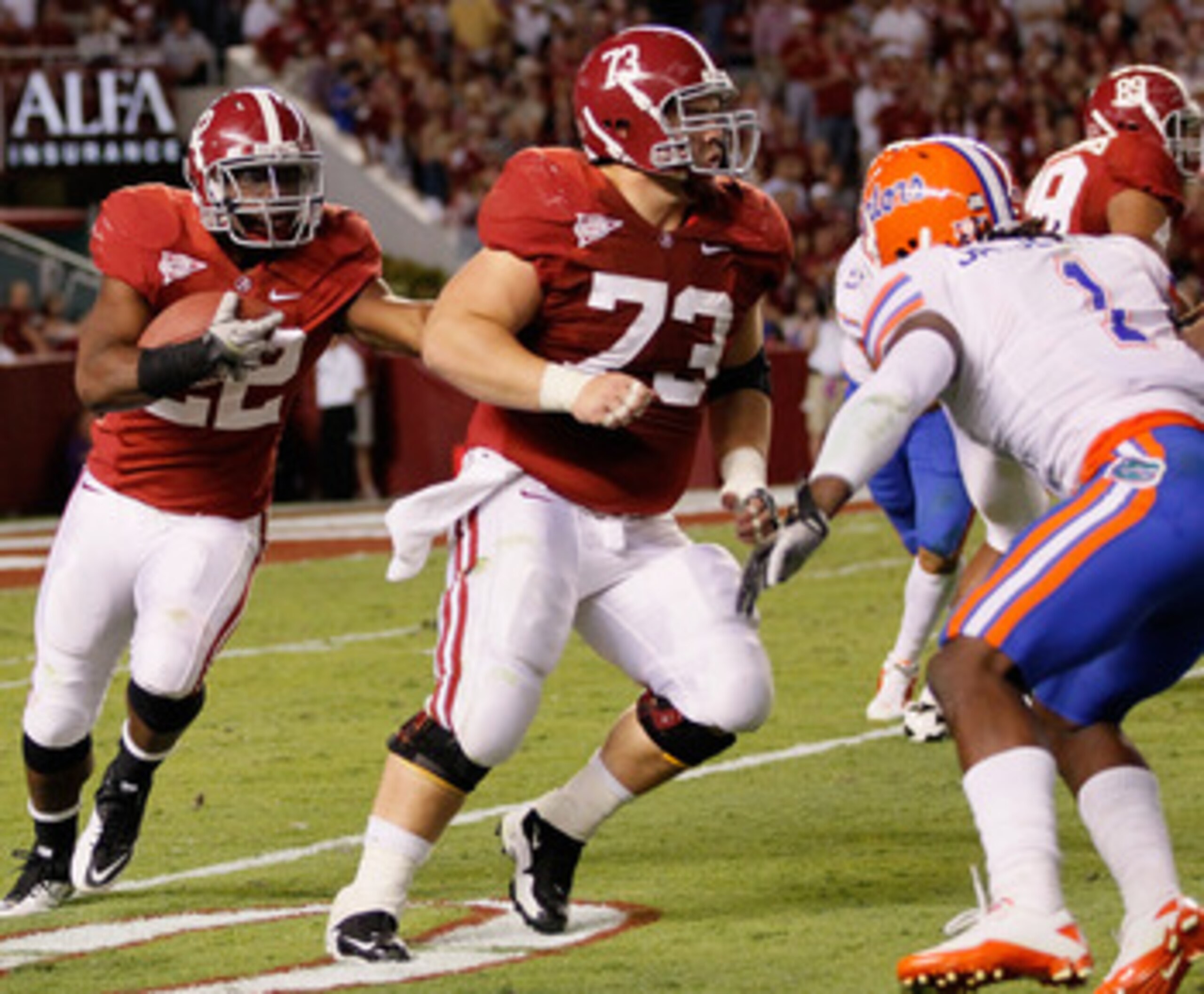 TUSCALOOSA, AL - OCTOBER 02:  Mark Ingram #22 and William Vlachos #73 of the Alabama Crimson Tide against the Florida Gators at Bryant-Denny Stadium on October 2, 2010 in Tuscaloosa, Alabama.  (Photo by Kevin C. Cox/Getty Images)