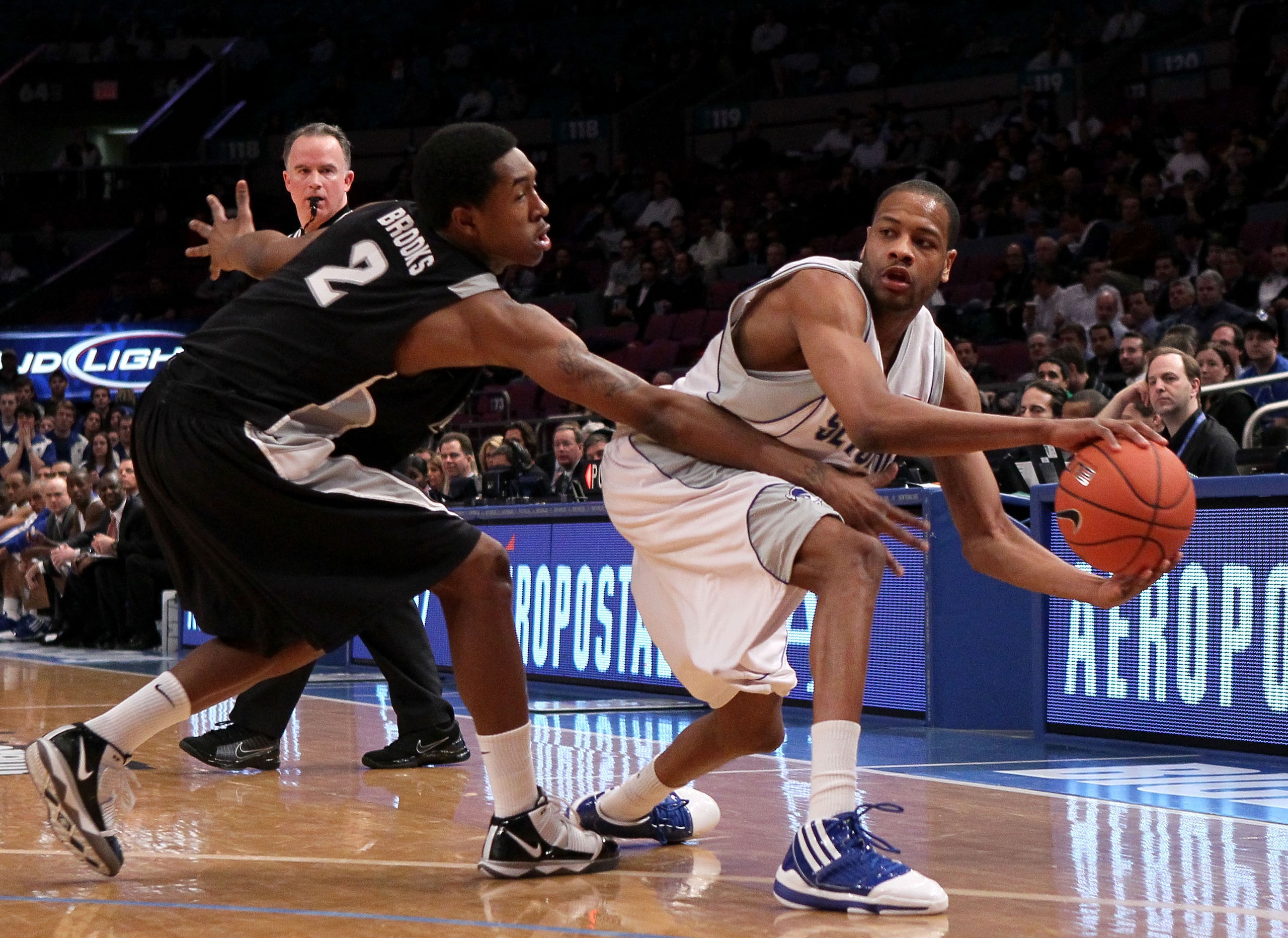 NEW YORK - MARCH 09: Robert Mitchell #23 of the Seton Hall Pirates looks to pass against Marshon Brooks #2 of the Providence Friars during the first round game of the Big East Basketball Tournament at Madison Square Garden on March 9, 2010 in New York, Ne