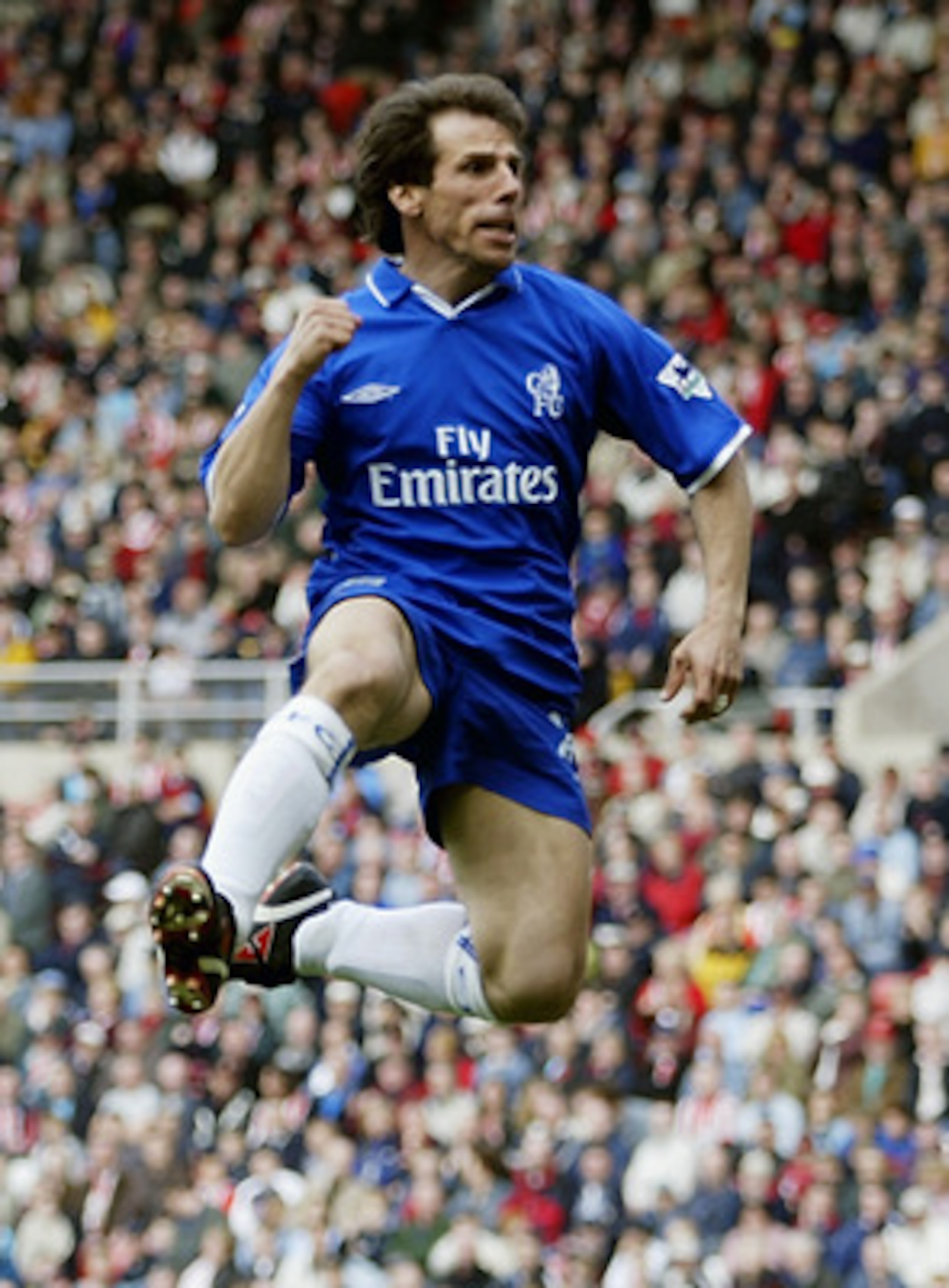 SUNDERLAND - APRIL 5: Gianfranco Zola of Chelsea celebrates scoring the equalising goal during the FA Barclaycard Premiership match between Sunderland and Chelsea held on April 5, 2003 at the Stadium of Light, in Sunderland, England. Chelsea won the mat SUNDERLAND - APRIL 5: Gianfranco Zola of Chelsea celebrates scoring the equalising goal during the FA Barclaycard Premiership match between Sunderland and Chelsea held on April 5, 2003 at the Stadium of Light, in Sunderland, England. Chelsea won the mat