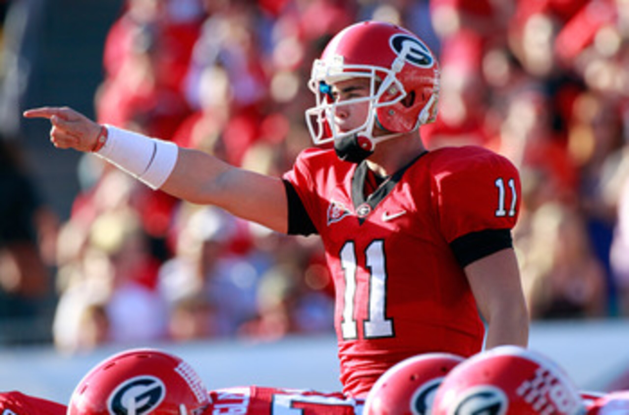 JACKSONVILLE, FL - OCTOBER 30:  Quarterback Aaron Murray of the Georgia Bulldogs points during the game against the Florida Gators at EverBank Field on October 30, 2010 in Jacksonville, Florida.  (Photo by Sam Greenwood/Getty Images)