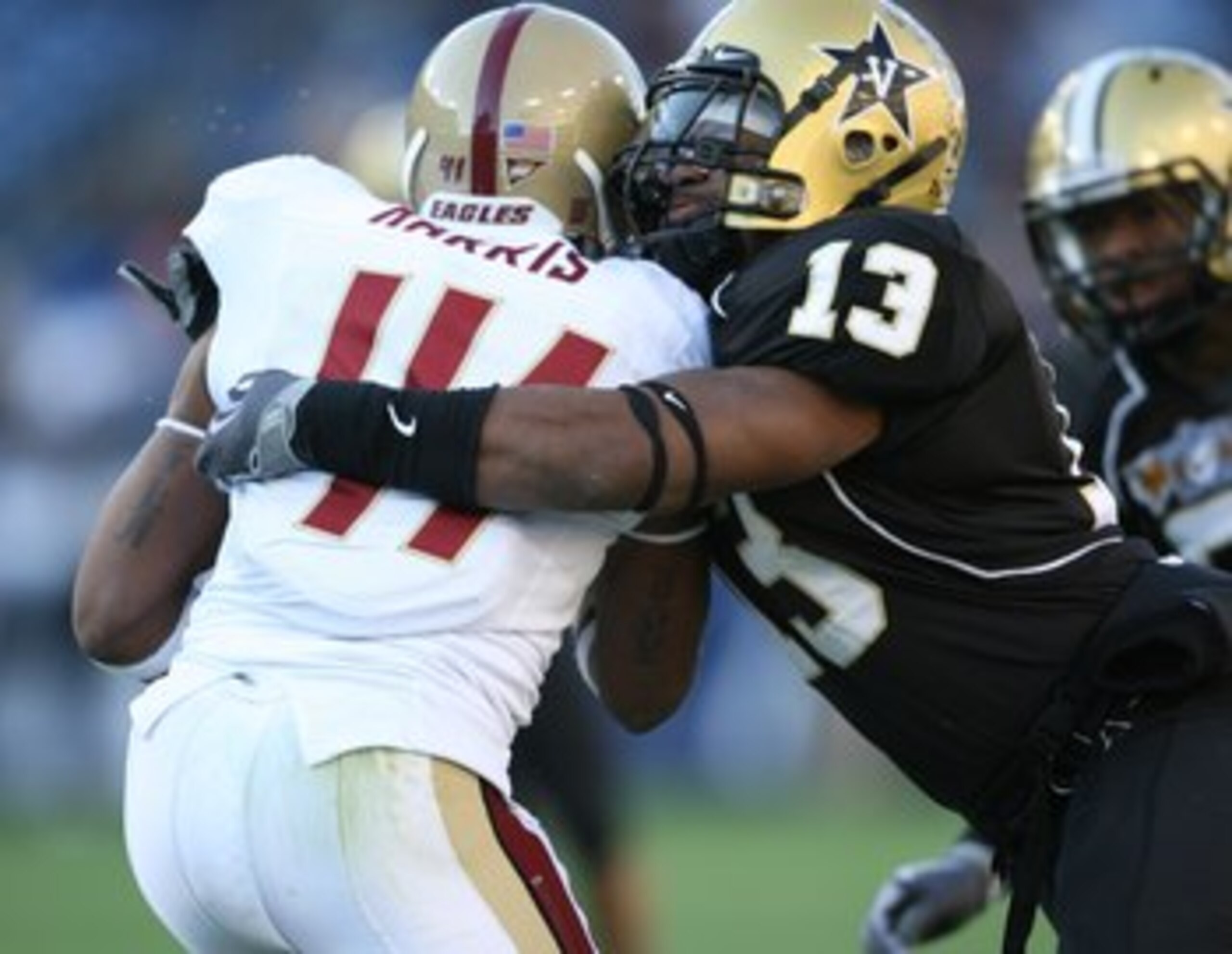 NASHVILLE, TN - DECEMBER 31:  Chris Marve #13 of the Vanderbilt Commodores tackles Montel Harris #41 of the Boston College Eagles during the Gaylord Hotels Music City Bowl at LP Field on December 31, 2008 in Nashville, Tennessee.  (Photo by Andy Lyons/Get
