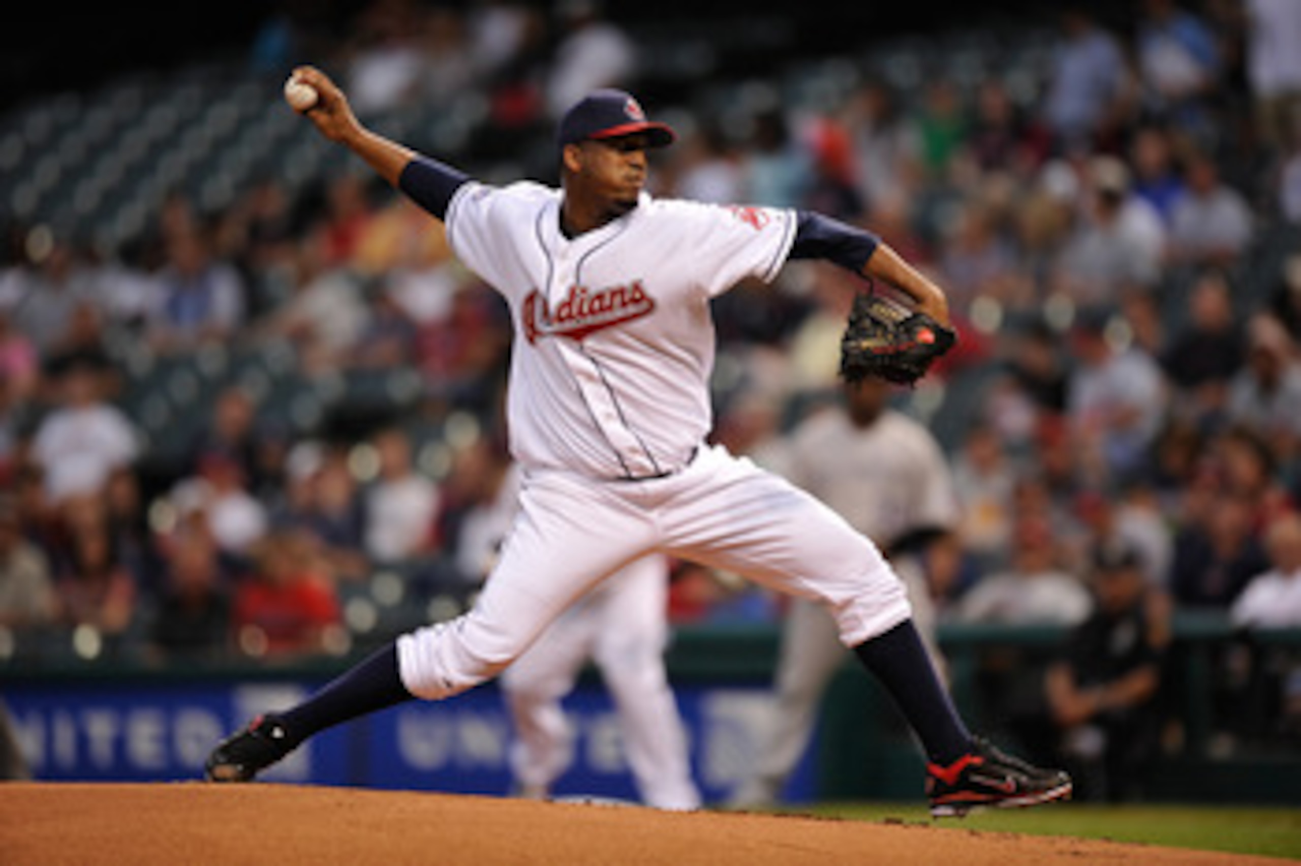 CLEVELAND, OH - JUNE 20:  Fausto Carmona #55 of the Cleveland Indians pitches against the Colorado Rockies at Progressive Field on June 20, 2011 in Cleveland, Ohio.  (Photo by Jamie Sabau/Getty Images)