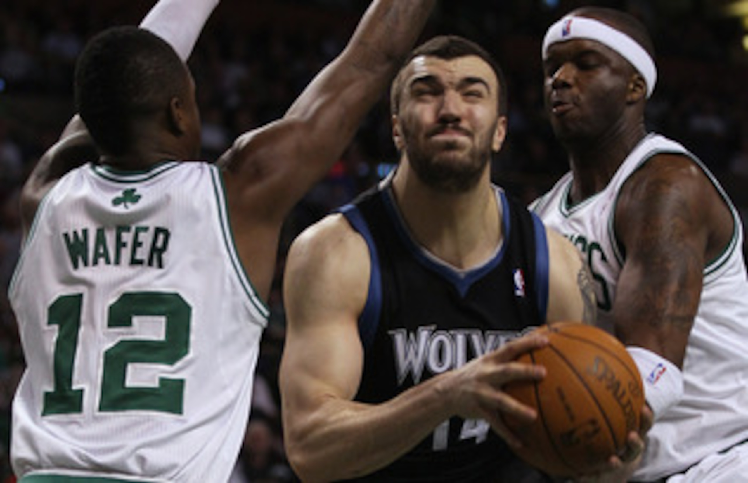 BOSTON, MA - JANUARY 03: Nikola Pekovic #14 of the Minnesota Timberwolves tries to get between Von Wafer #12 and Jermaine O'Neal #7 of the Boston Celtics on January 3, 2011 at the TD Garden in Boston, Massachusetts. The Celtics defeated the Timberwolves BOSTON, MA - JANUARY 03: Nikola Pekovic #14 of the Minnesota Timberwolves tries to get between Von Wafer #12 and Jermaine O'Neal #7 of the Boston Celtics on January 3, 2011 at the TD Garden in Boston, Massachusetts. The Celtics defeated the Timberwolves
