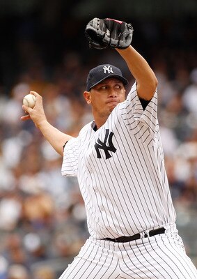 NEW YORK - JUNE 12:  Freddy Garcia #36 of the New York Yankees delivers a pitch in the first inning against the Cleveland Indians on June 12, 2011 at Yankee Stadium in the Bronx borough of New York City.  (Photo by Mike Stobe/Getty Images)