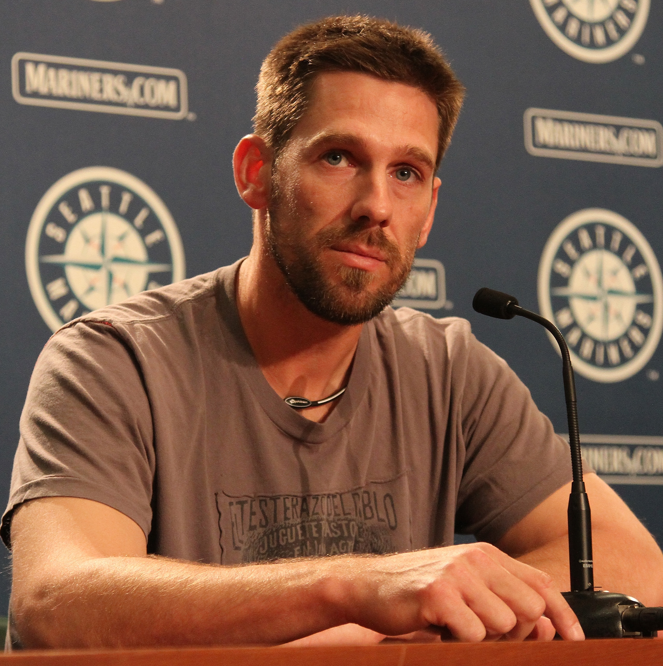 SEATTLE - JULY 09:  Cliff Lee of the Seattle Mariners speaks at a press conference announcing his trade to the Texas Rangers for first baseman Justin Smoak, pitcher Blake Beavan, Double-A Frisco reliever Josh Lueke and second baseman Matt Lawson at Safeco