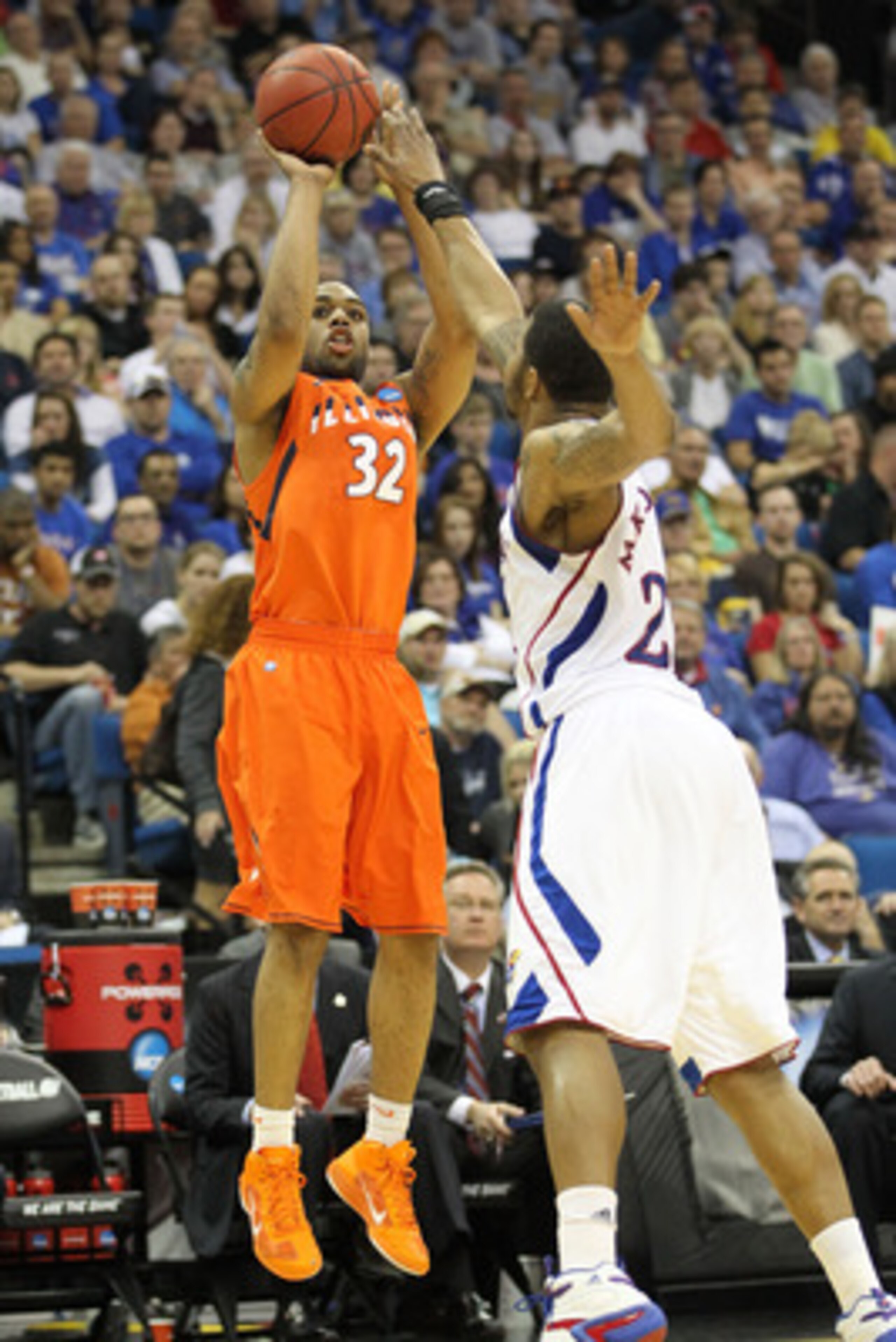 TULSA, OK - MARCH 20:  Demetri McCamey #32 of the Illinois Fighting Illini takes a shot over Markieff Morris #21 of the Kansas Jayhawks during the third round of the 2011 NCAA men's basketball tournament at BOK Center on March 20, 2011 in Tulsa, Oklahoma.