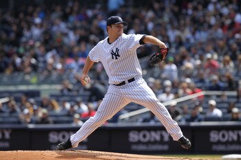 NEW YORK, NY - APRIL 03:  Phil Hughes #65 of the New York Yankees pitches against the Detroit Tigers at Yankee Stadium on April 3, 2011 in the Bronx borough of New York City.  (Photo by Nick Laham/Getty Images)