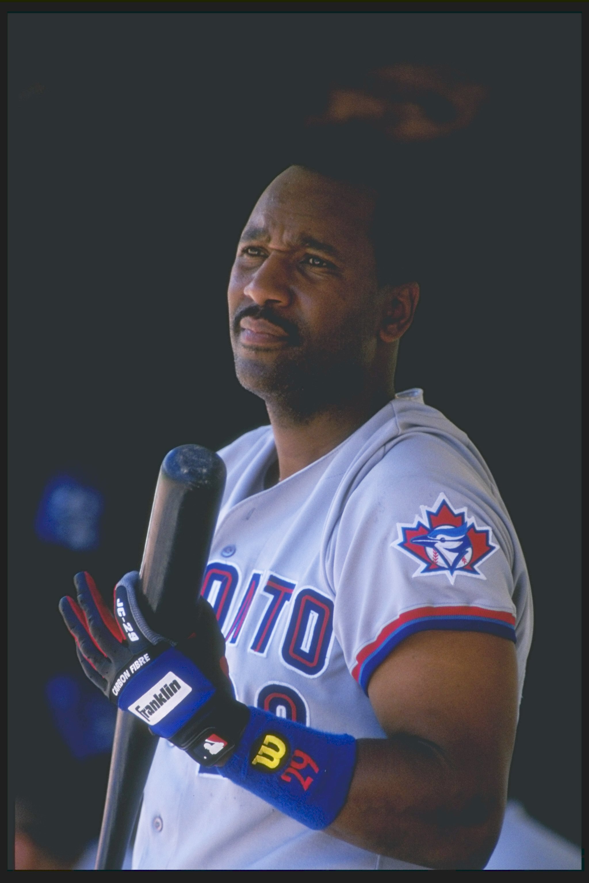 31 May 1997:  Infielder Joe Carter of the Toronto Blue Jays looks on during a game against the Oakland Athletics at the Oakland-Alameda County Coliseum in Oakland, California.  The Blue Jays won the game, 13-3. Mandatory Credit: Otto Greule  /Allsport