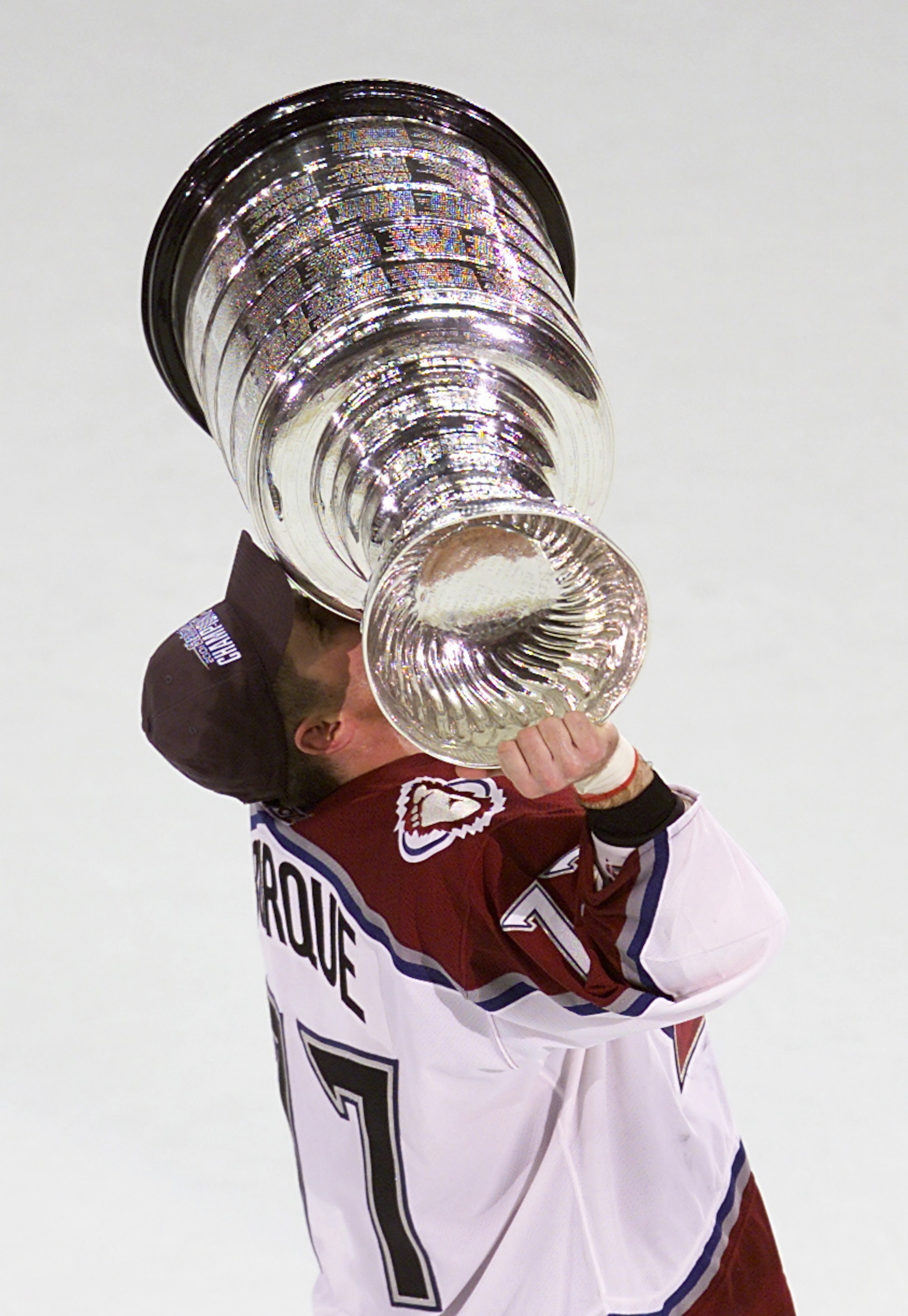 9 Jun 2001: Ray Bourque #77 of the Colorado Avalanche kisses the Stanley Cup as an Avalanche in Denver, Colorado after 22 seasons in pursuit of the NHL Stanley Cup Championship. DIGITAL IMAGE. Mandatory Credit: Brian Bahr/ALLSPORT 9 Jun 2001: Ray Bourque #77 of the Colorado Avalanche kisses the Stanley Cup as an Avalanche in Denver, Colorado after 22 seasons in pursuit of the NHL Stanley Cup Championship. DIGITAL IMAGE. Mandatory Credit: Brian Bahr/ALLSPORT