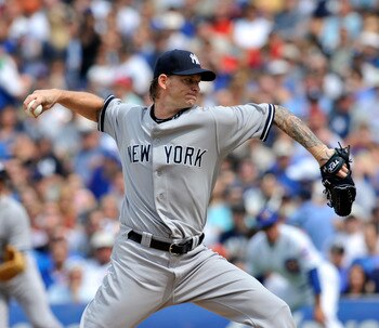 CHICAGO, IL - JUNE 18: A.J. Burnett # 34 of the New York Yankees pitches against the Chicago Cubs on June 18, 2011 at Wrigley Field in Chicago, Illinois.  (Photo by David Banks/Getty Images)