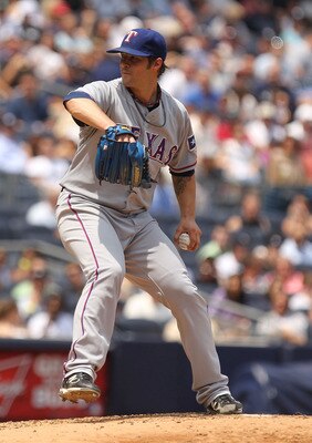 NEW YORK, NY - JUNE 16:  C.J. Wilson #36 of the Texas Rangers in action against the New York Yankees during their game on June 16, 2011 at Yankee Stadium in the Bronx borough of New York City.  (Photo by Al Bello/Getty Images)