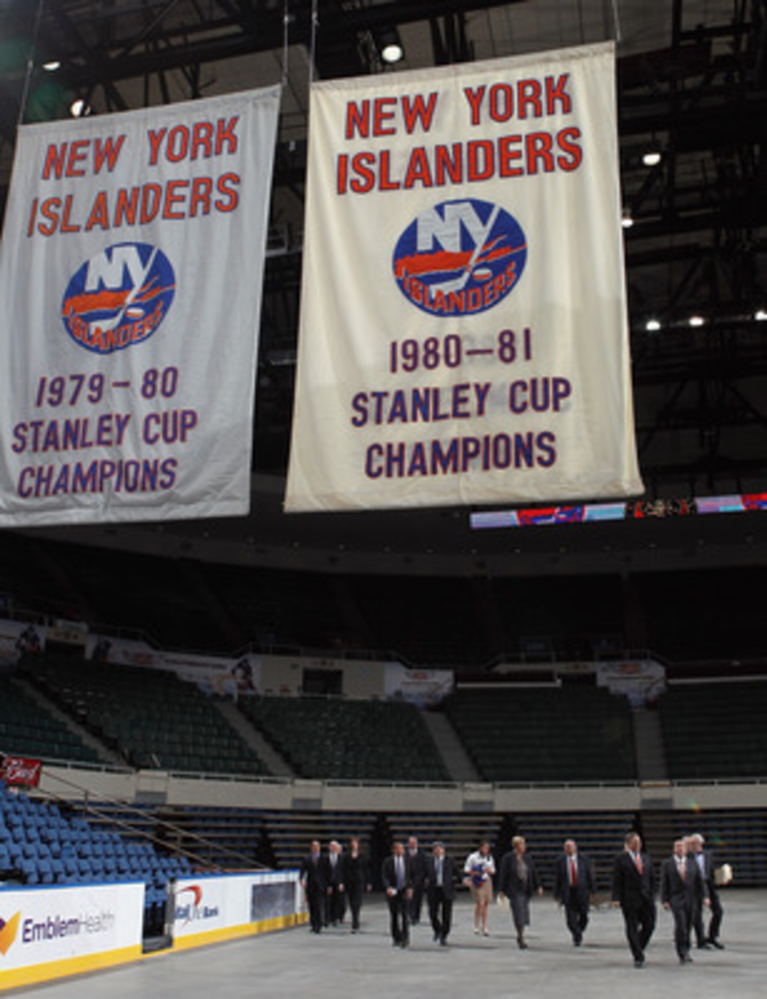 UNIONDALE, NY - MAY 11:  New York Islanders owner Charles Wang and Nassau County Executive Edward Mangano arrive to announce a referendum that will build a new arena and keep the Islanders in place through 2045 during a press conference at the Nassau Vete