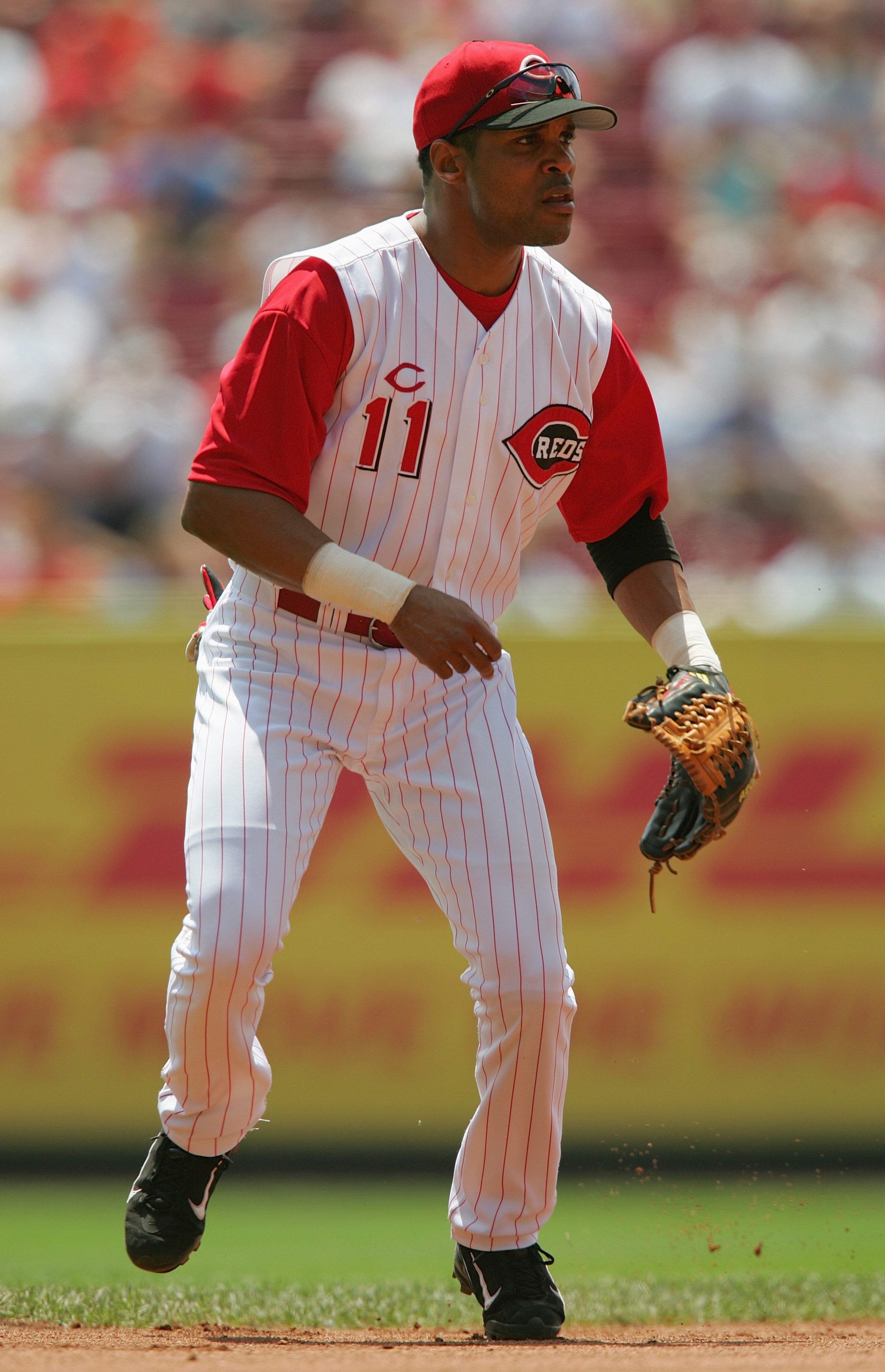 CINCINNATI, OH - JUNE 17:  Barry Larkin #11 of the Cincinnati Reds focuses on home plate as he prepares for a play during the interleague game against the Texas Rangers at the Great American Ball Park on June 17, 2004 in Cincinnati, Ohio.  The Reds defeat