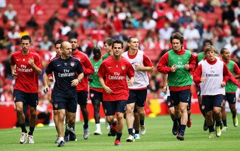 LONDON, ENGLAND - AUGUST 05:  Cesc Fabregas of Arsenal (C) trains with his team mates during an Arsenal open training session at Emirates Stadium on August 5, 2010 in London, England.  (Photo by Bryn Lennon/Getty Images)