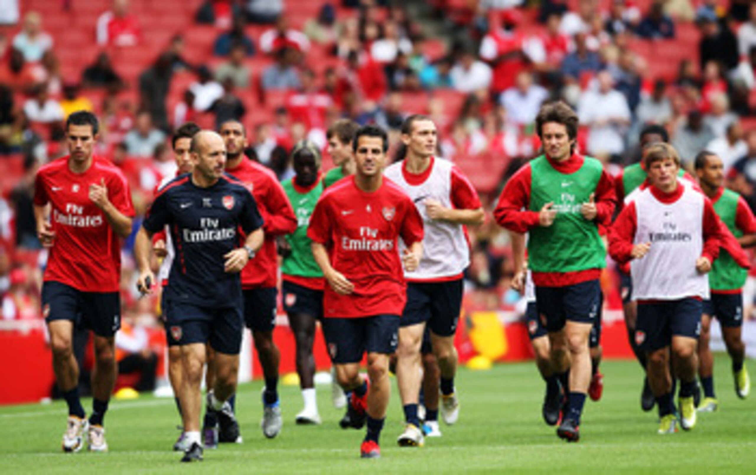 LONDON, ENGLAND - AUGUST 05:  Cesc Fabregas of Arsenal (C) trains with his team mates during an Arsenal open training session at Emirates Stadium on August 5, 2010 in London, England.  (Photo by Bryn Lennon/Getty Images)