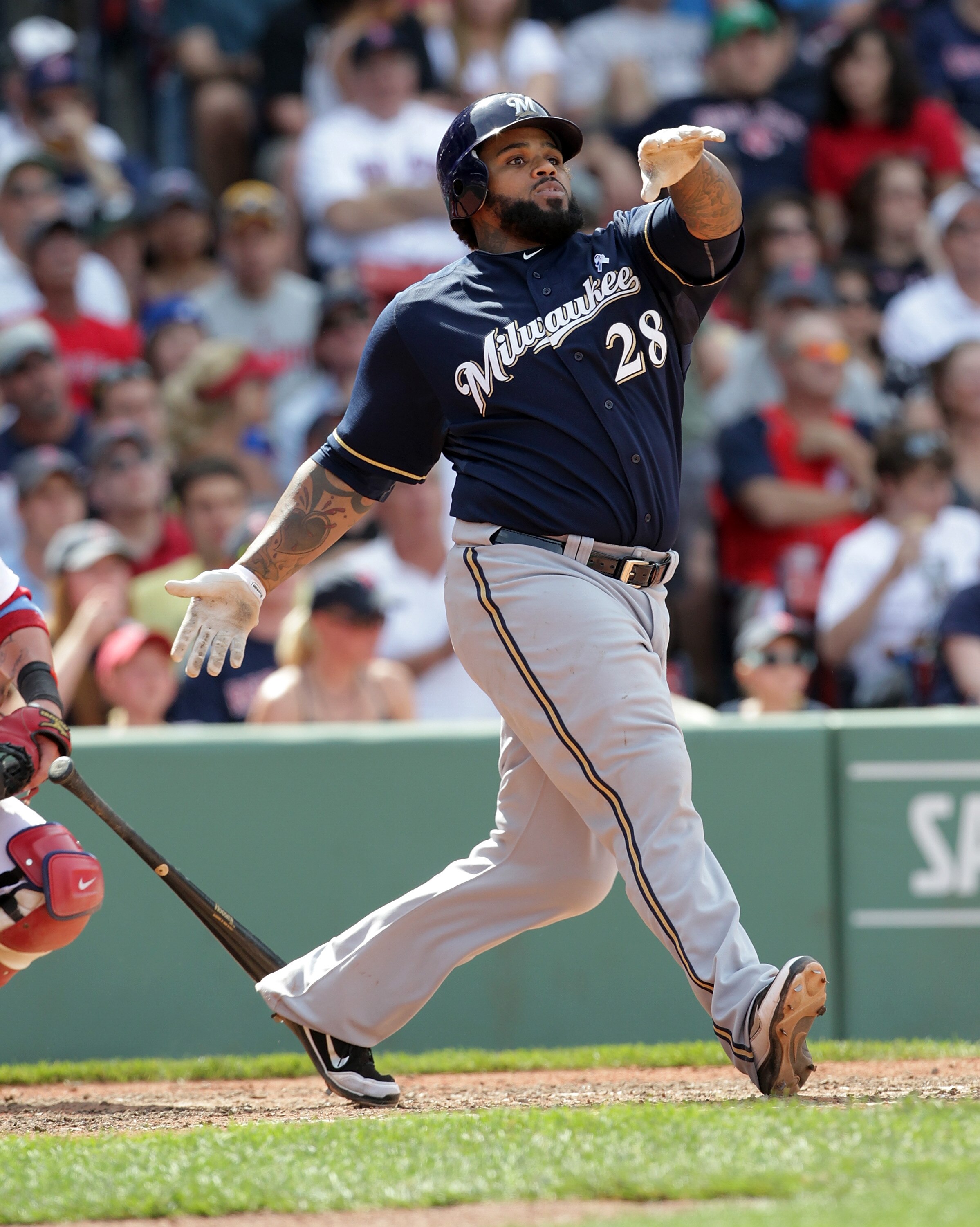 BOSTON, MA  - JUNE 19: Prince Fielder #28 of the Milwaukee Brewers connects for a home run against the Boston Red Sox at Fenway Park on June 19, 2011 in Boston, Massachusetts.  (Photo by Jim Rogash/Getty Images)