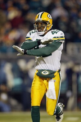 PHILADELPHIA - JANUARY 11: Safety Darren Sharper #42 of the Green Bay Packers celebrates after making a play on defense during the game against the Philadelphia Eagles in the NFC divisional playoffs on January 11, 2004 at Lincoln Financial Field in Phila PHILADELPHIA - JANUARY 11: Safety Darren Sharper #42 of the Green Bay Packers celebrates after making a play on defense during the game against the Philadelphia Eagles in the NFC divisional playoffs on January 11, 2004 at Lincoln Financial Field in Phila