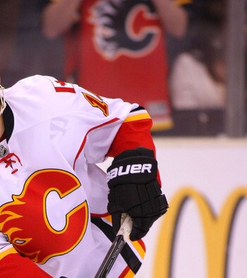 LOS ANGELES, CA - MARCH 21:  Tom Kostopoulos #16 of the Calgary Flames skates during warm-up prior to their NHL game against the Los Angeles Kings at Staples Center on March 21, 2011 in Los Angeles, California. The Kings defeated the Flames 2-1 in shootou