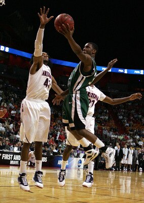 MIAMI - MARCH 22: Forward Jordan Hill #43 of the University of Arizona Wildcats blocks the shot of guard Norris Cole #30 of the Cleveland State University Vikings during the second round of the NCAA Division I Men's Basketball Tournament at the American MIAMI - MARCH 22: Forward Jordan Hill #43 of the University of Arizona Wildcats blocks the shot of guard Norris Cole #30 of the Cleveland State University Vikings during the second round of the NCAA Division I Men's Basketball Tournament at the American