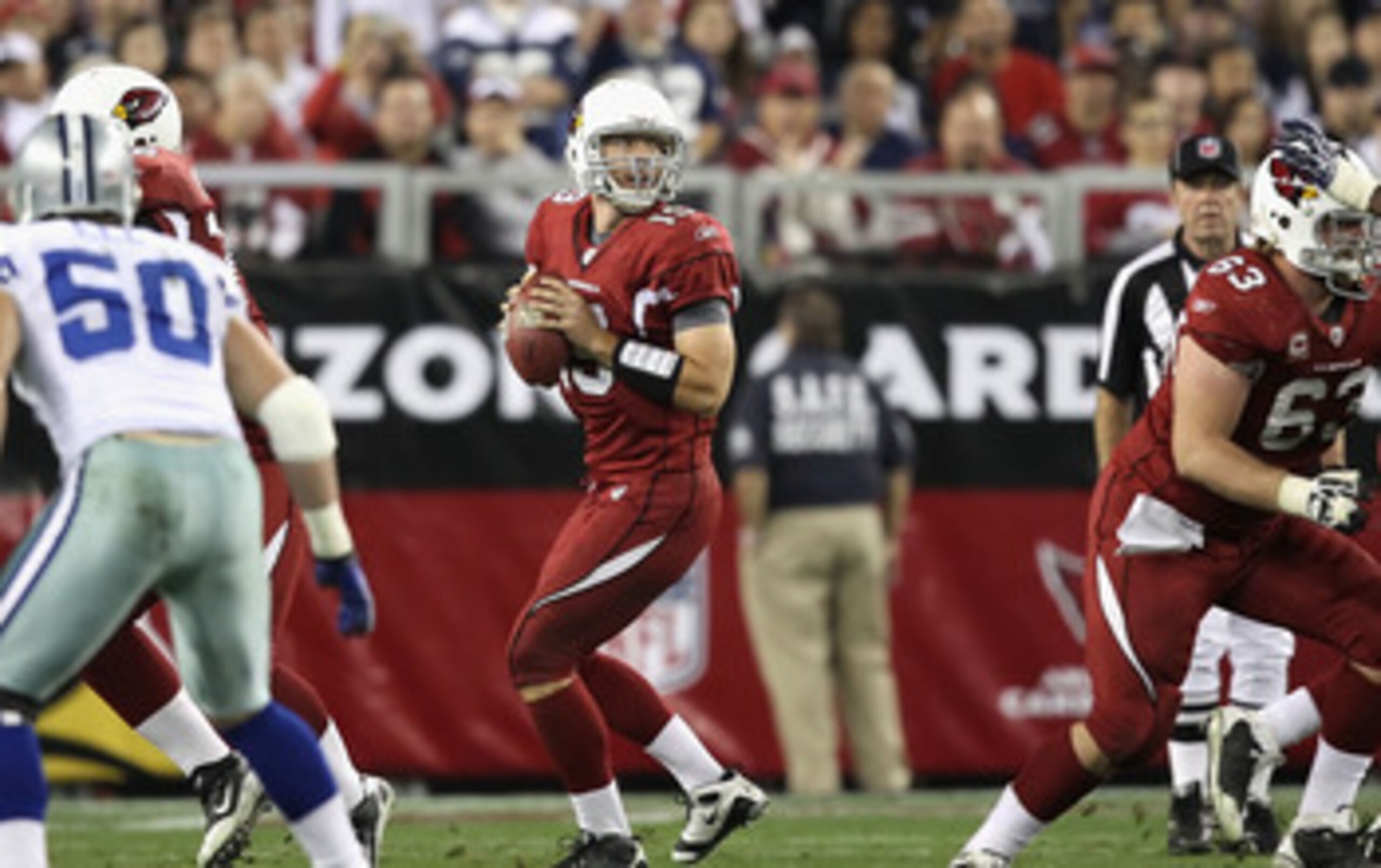 GLENDALE, AZ - DECEMBER 25:  Quarterback John Skelton #19 of the Arizona Cardinals drops back to half during the NFL game against the Dallas Cowboys at the University of Phoenix Stadium on December 25, 2010 in Glendale, Arizona. The Cardinals defeated the