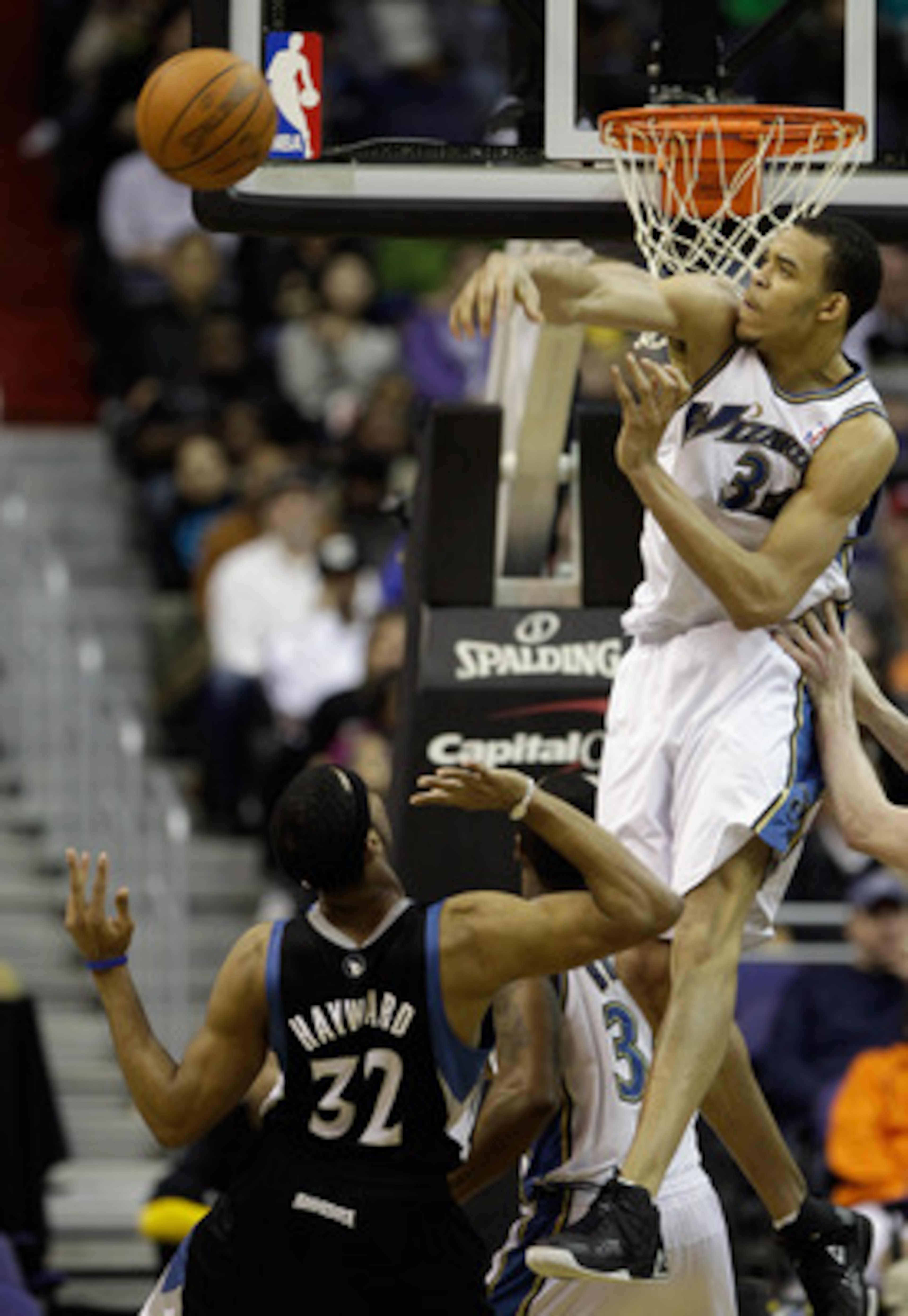 WASHINGTON, DC - MARCH 05:  JaVale McGee #34 of the Washington Wizards blocks a shot by Lazar Hayward #32 of the Minnesota Timberwolves at the Verizon Center on March 5, 2011 in Washington, DC. NOTE TO USER: User expressly acknowledges and agrees that, by
