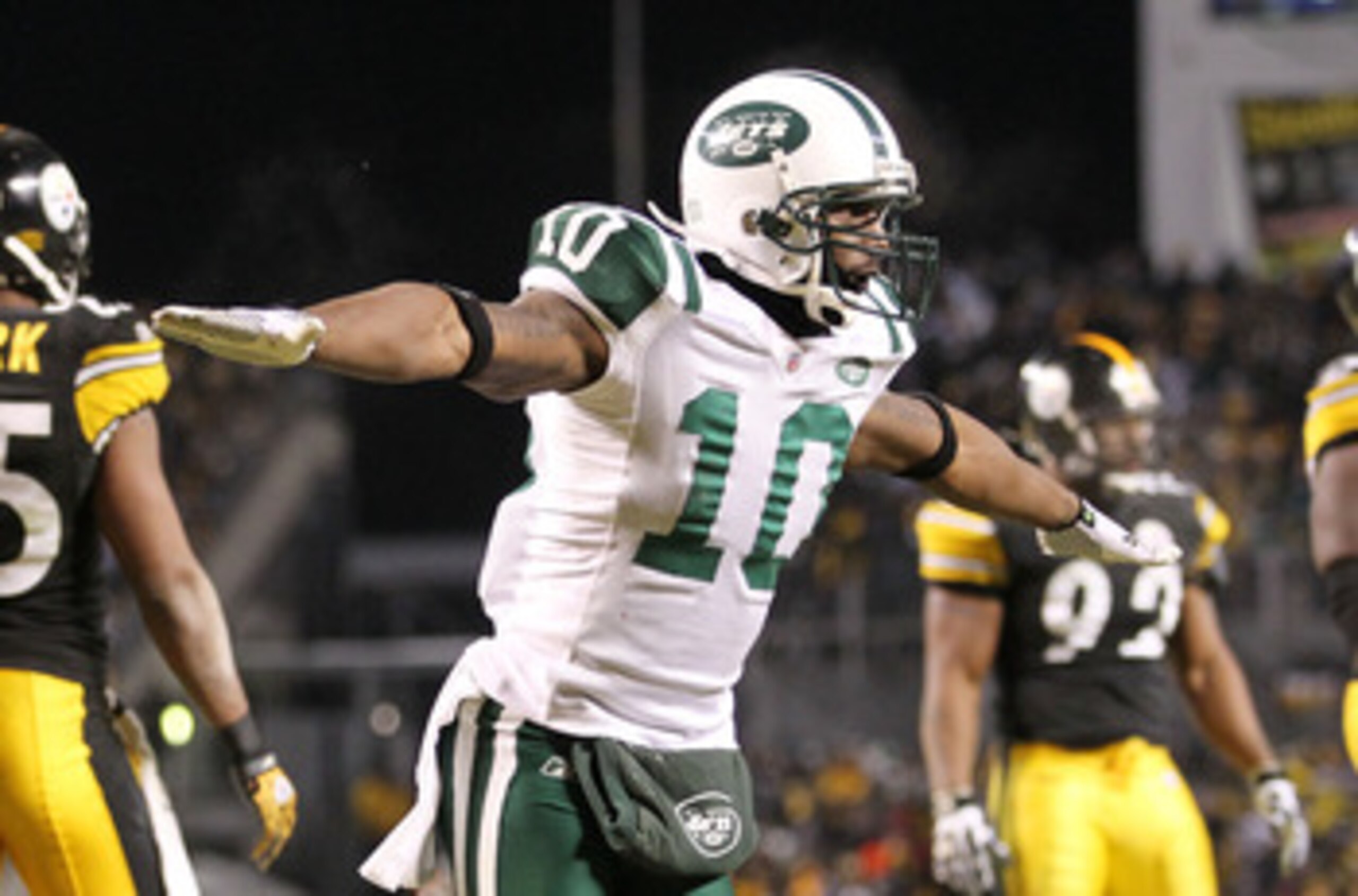 PITTSBURGH, PA - JANUARY 23:  Santonio Holmes #10 of the New York Jets celebrates during their 19 to 24 loss to the Pittsburgh Steelers in the 2011 AFC Championship game at Heinz Field on January 23, 2011 in Pittsburgh, Pennsylvania.  (Photo by Ronald Mar