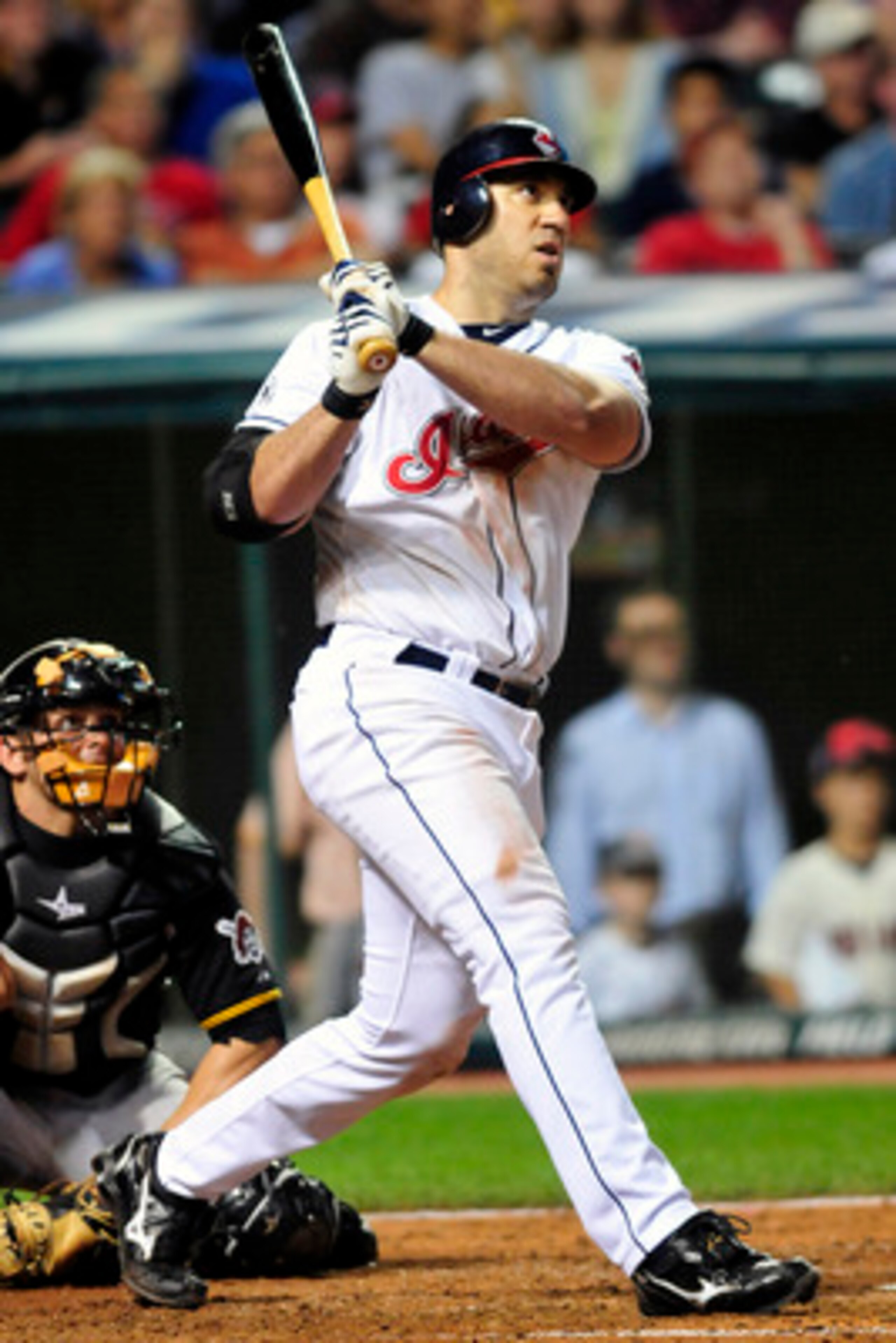 CLEVELAND, OH - JUNE 17:  Travis Hafner #48 of the Cleveland Indians watches an RBI double during the eighth inning against the Pittsburgh Pirates at Progressive Field on June 17, 2011 in Cleveland, Ohio. The Indians defeated the Pirates 5-1. (Photo by Ja