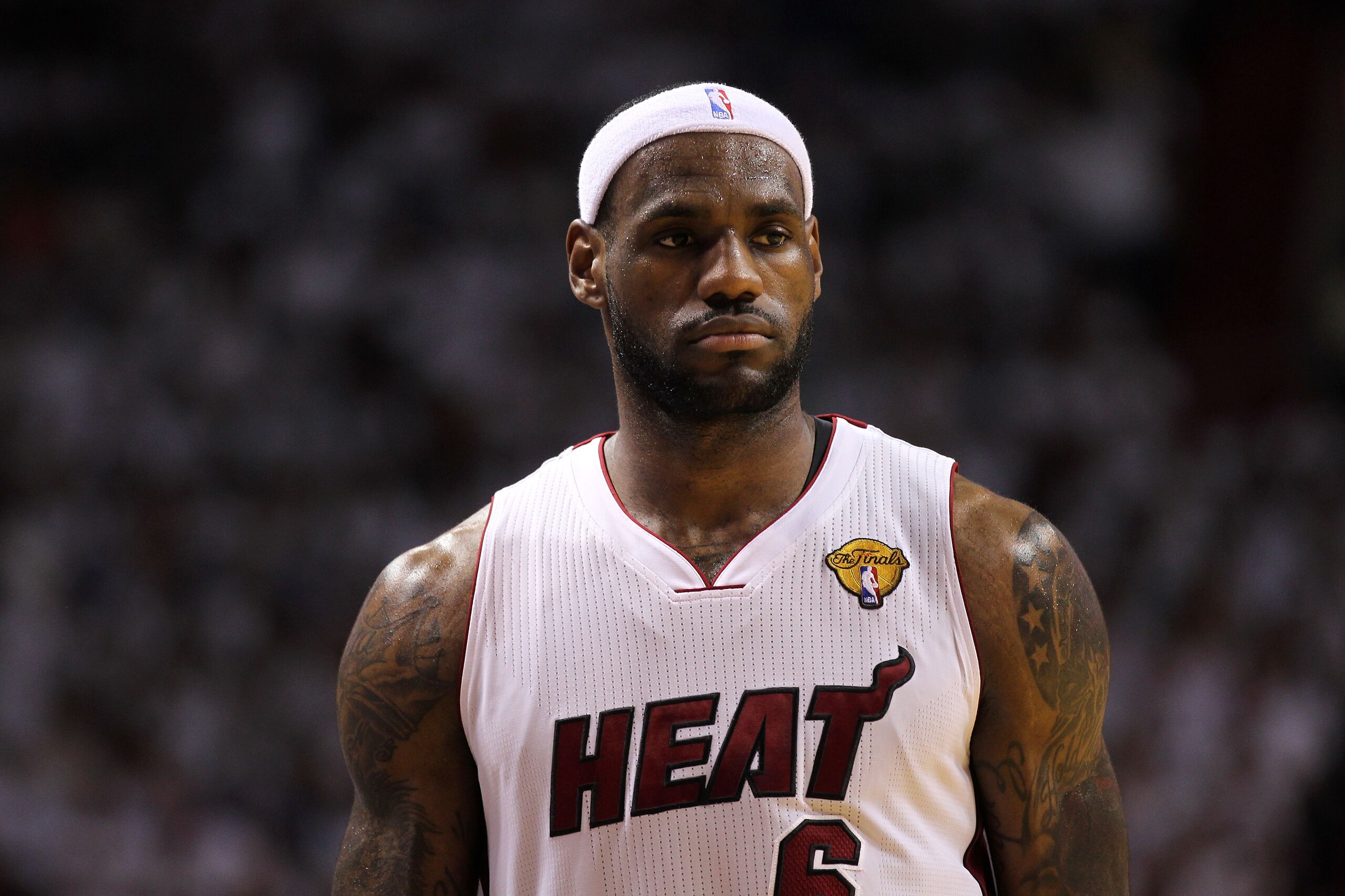 MIAMI, FL - JUNE 12:  LeBron James #6 of the Miami Heat looks on against the Dallas Mavericks in Game Six of the 2011 NBA Finals at American Airlines Arena on June 12, 2011 in Miami, Florida. NOTE TO USER: User expressly acknowledges and agrees that, by d