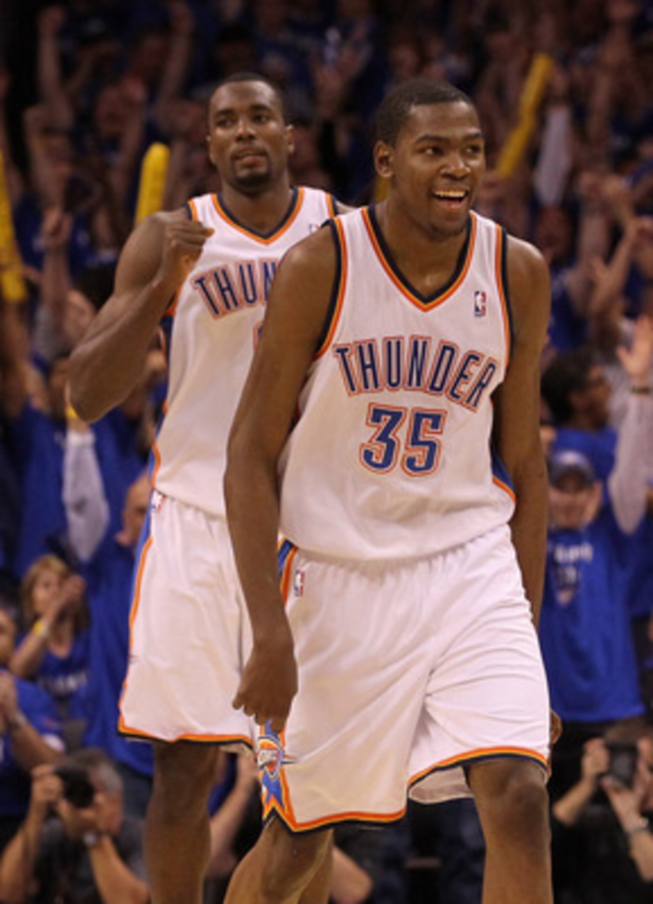OKLAHOMA CITY, OK - MAY 23:  Kevin Durant #35 and Serge Ibaka #9 of the Oklahoma City Thunder react in the fourth quarter while taking on the Dallas Mavericks in Game Four of the Western Conference Finals during the 2011 NBA Playoffs at Oklahoma City Aren