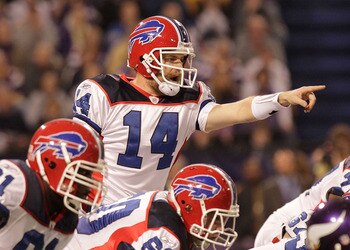 MINNEAPOLIS, MN - DECEMBER 05:  Ryan Fitzpatrick #14 of the Buffalo Bills stands at the line against the Minnesota Vikings at the Mall of America Field at the Hubert H. Humphrey Metrodome on December 5, 2010 in Minneapolis, Minnesota.  (Photo by Nick Laha