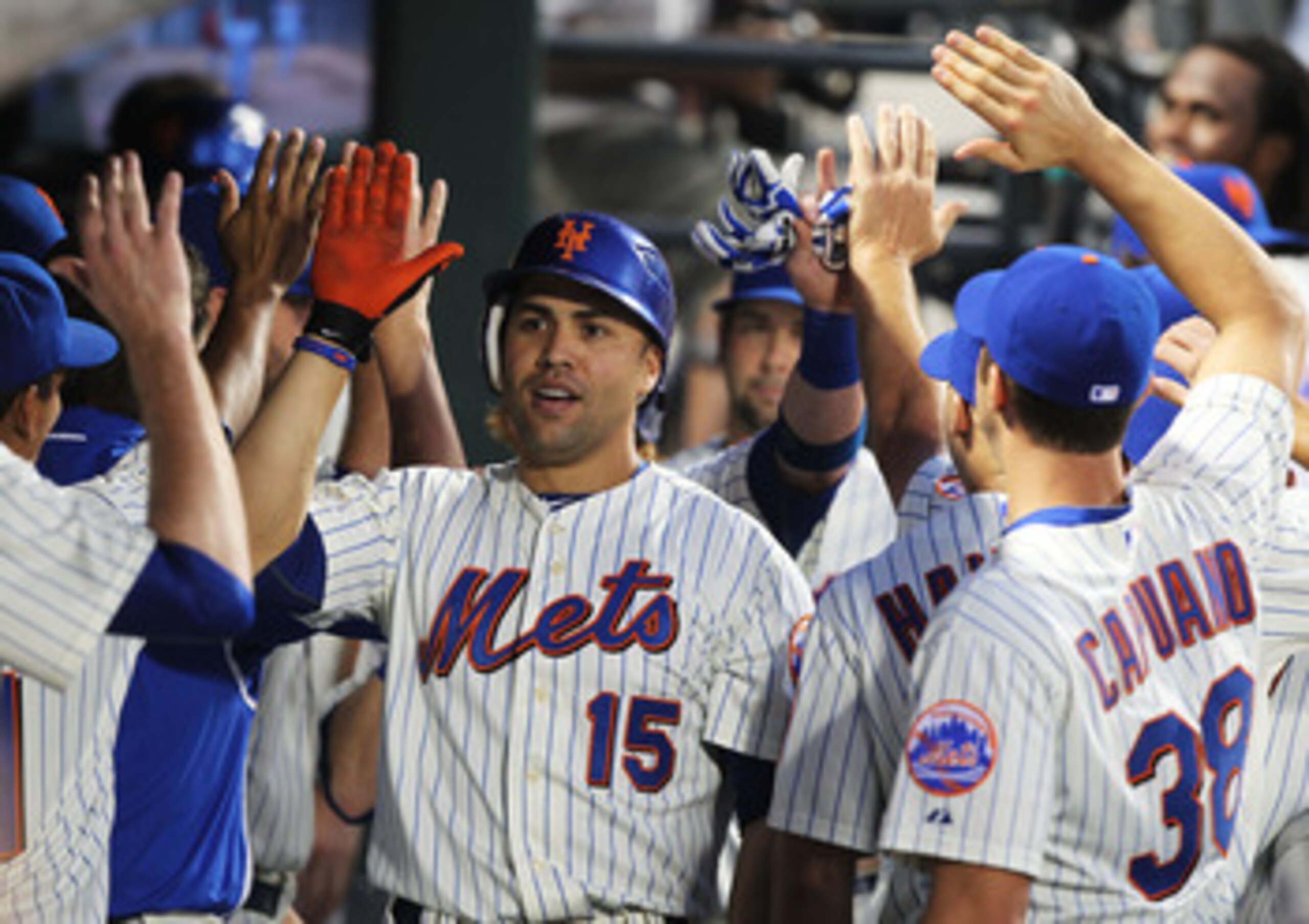 NEW YORK, NY - JUNE 18:  Carlos Beltran #15 of the New York Mets celebrates a two run home run with teamates in the fifth inning against the Los Angeles Angels of Anaheim during their game on June 18, 2011 at Citi Field in the Flushing neighborhood of the