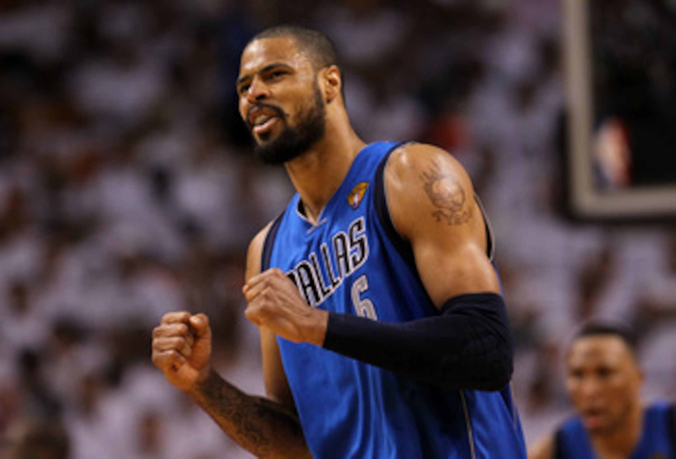MIAMI, FL - JUNE 12:  Tyson Chandler #6 of the Dallas Mavericks reacts against the Miami Heat in the third quarter of Game Six of the 2011 NBA Finals at American Airlines Arena on June 12, 2011 in Miami, Florida. NOTE TO USER: User expressly acknowledges