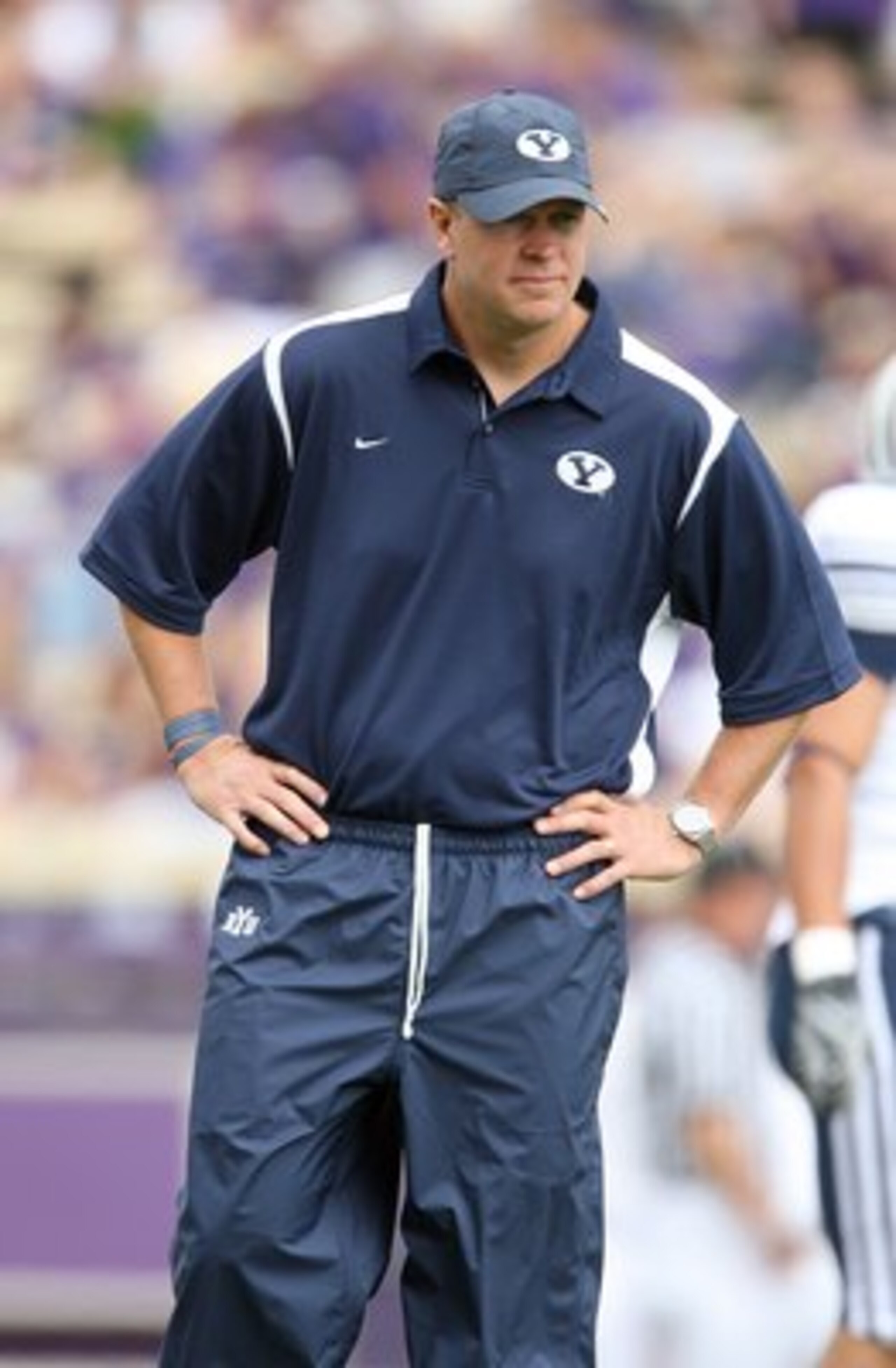 SEATTLE - SEPTEMBER 6: Head Coach Bronco Mendenhall of the BYU Cougars looks on during warm-up prior to their game against the Washington Huskies on September 6, 2008 at Husky Stadium in Seattle, Washington. The Cougars defeated the Huskies 28-27. (Photo SEATTLE - SEPTEMBER 6: Head Coach Bronco Mendenhall of the BYU Cougars looks on during warm-up prior to their game against the Washington Huskies on September 6, 2008 at Husky Stadium in Seattle, Washington. The Cougars defeated the Huskies 28-27. (Photo