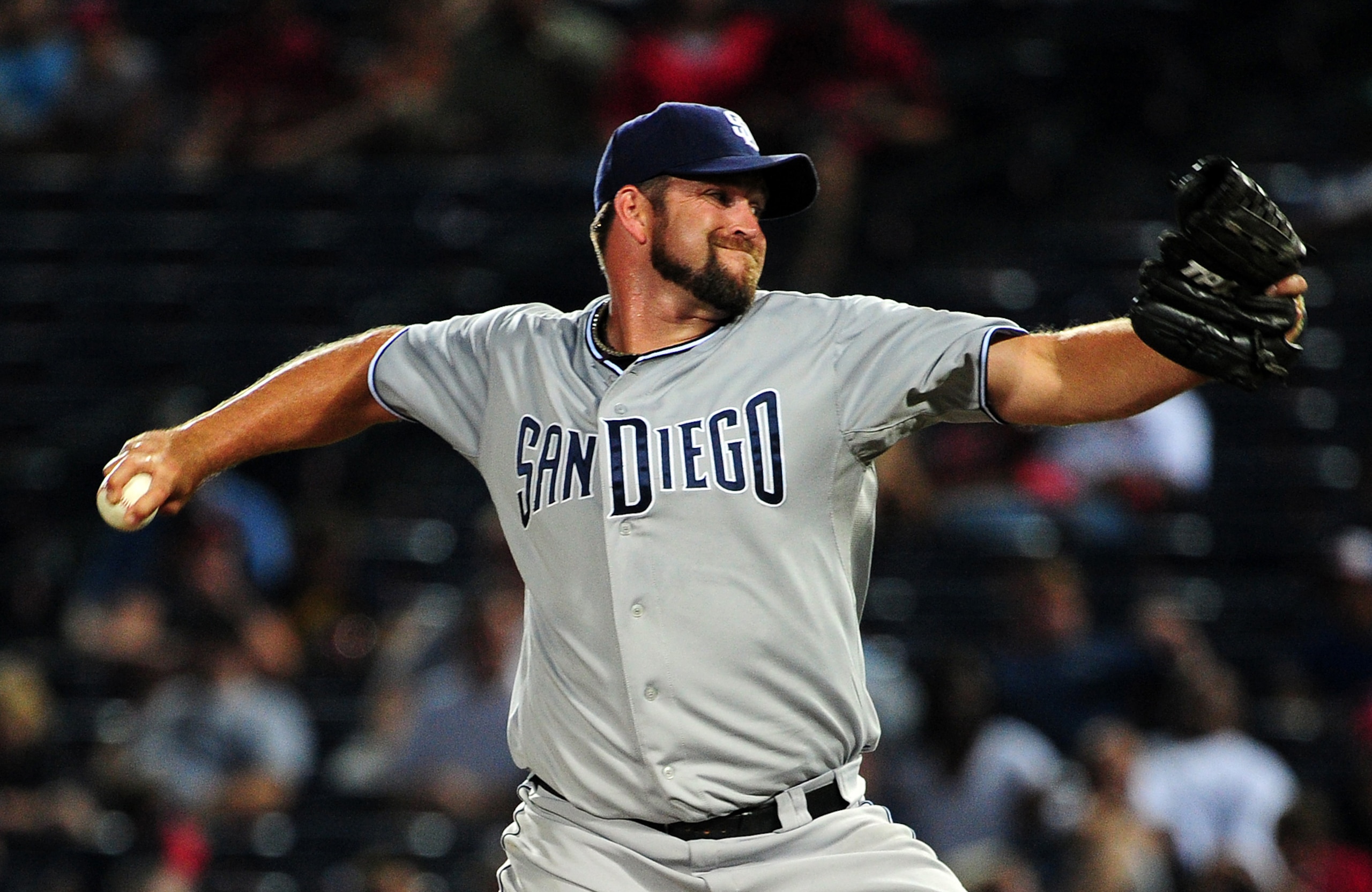 ATLANTA - MAY 31: Heath Bell #21 of the San Diego Padres pitches against the Atlanta Braves at Turner Field on May 31, 2011 in Atlanta, Georgia. (Photo by Scott Cunningham/Getty Images)