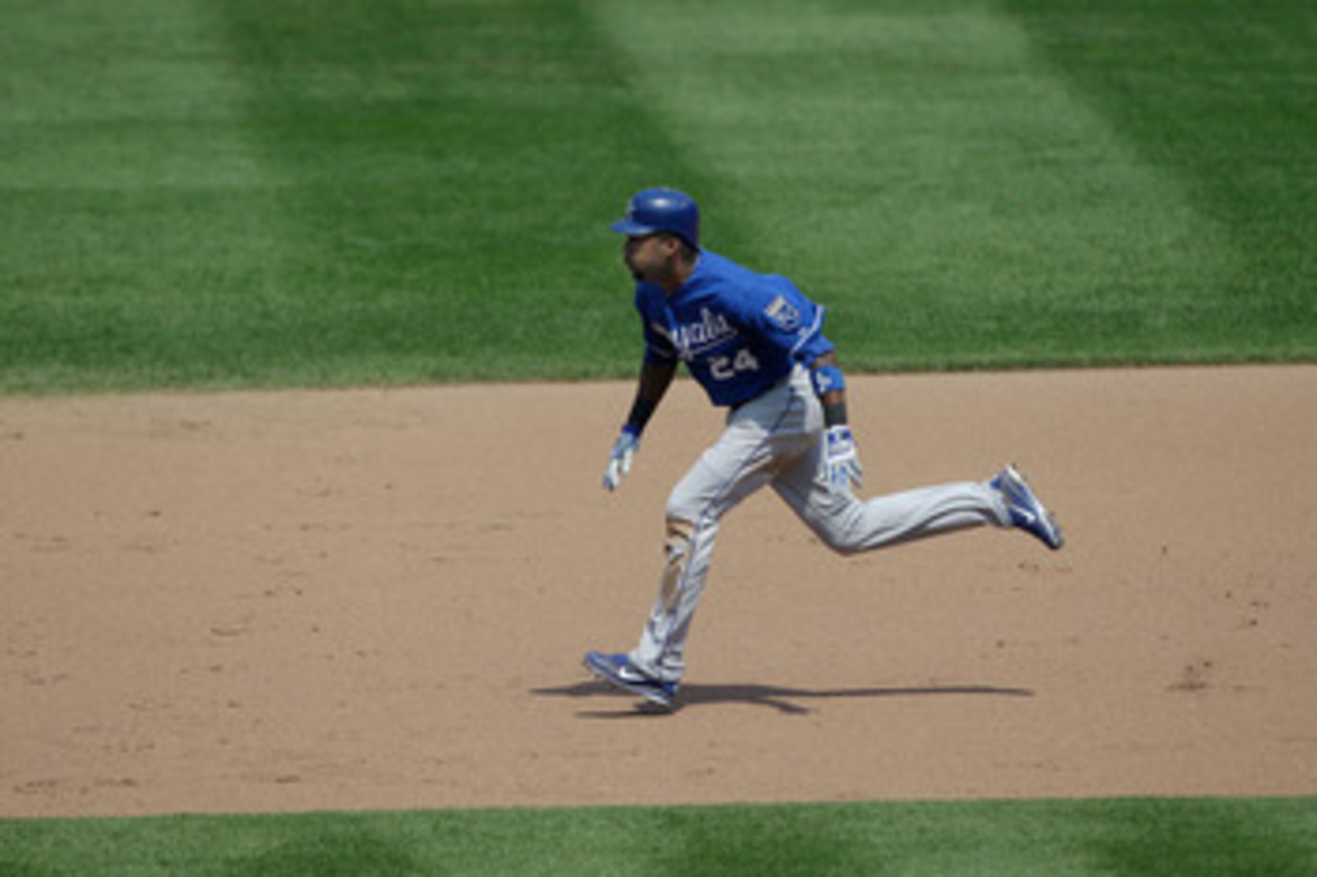 BALTIMORE, MD - MAY 26:  Wilson Betemit #24 of the Kansas City Royals safely stretches a single into a double during the ninth inning against the Baltimore Orioles at Oriole Park at Camden Yards on May 26, 2011 in Baltimore, Maryland.  (Photo by Rob Carr/