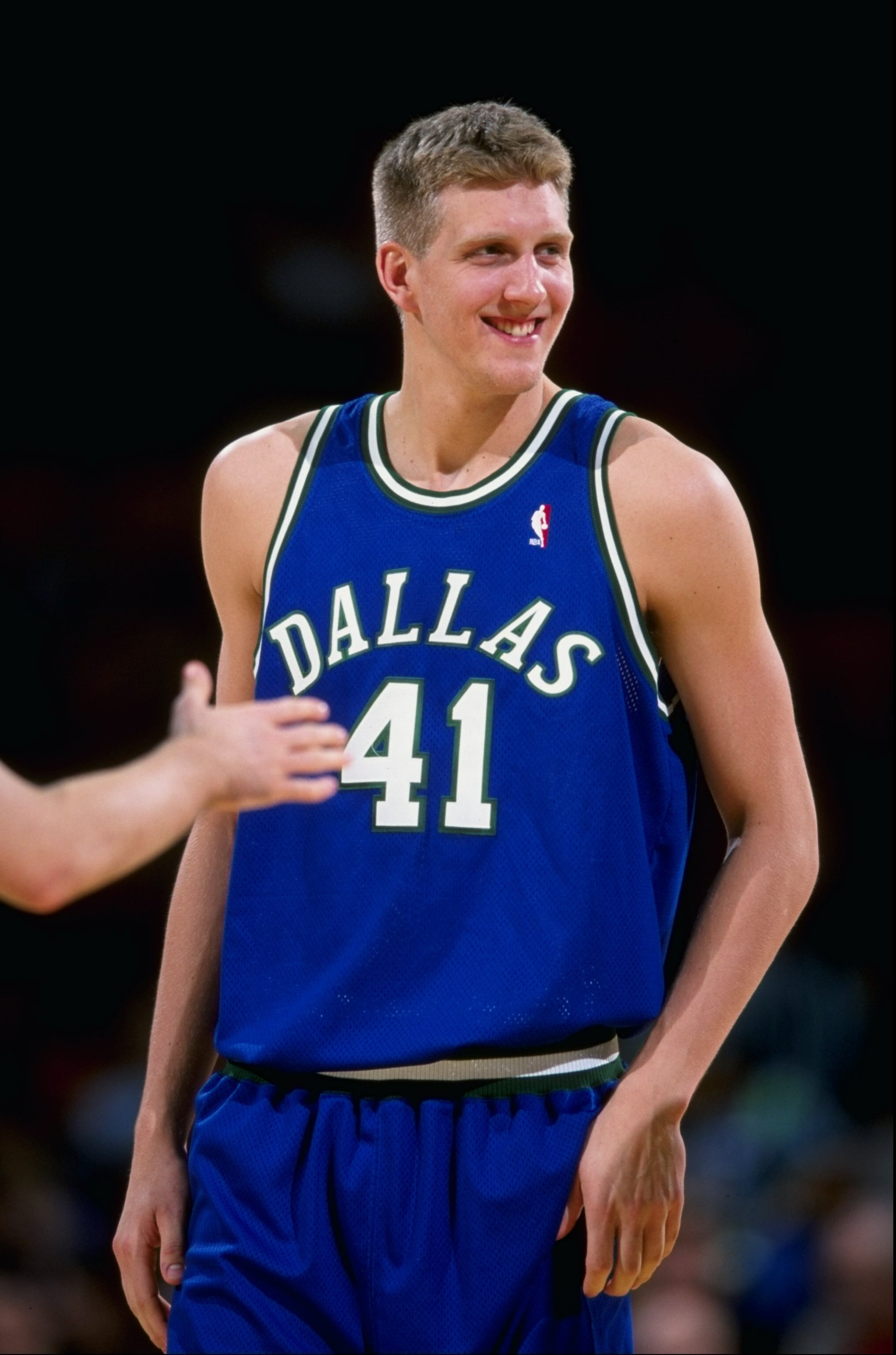 17 Feb 1999: Dirk Nowitzki #41 of the Dallas Mavericks smiles on the court during the game against the Los Angeles Lakers at the Great Western Forum in Inglewood, California. The Lakers defeated the Mavericks 101-88.  Mandatory Credit: Vincent Laforet  /A