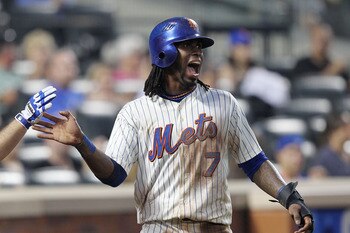 NEW YORK, NY - JUNE 18:  Jose Reyes #7 of the New York Mets celebrates scoring against the Los Angeles Angels of Anaheim during their game on June 18, 2011 at Citi Field in the Flushing neighborhood of the Queens borough of New York City.  (Photo by Al Be