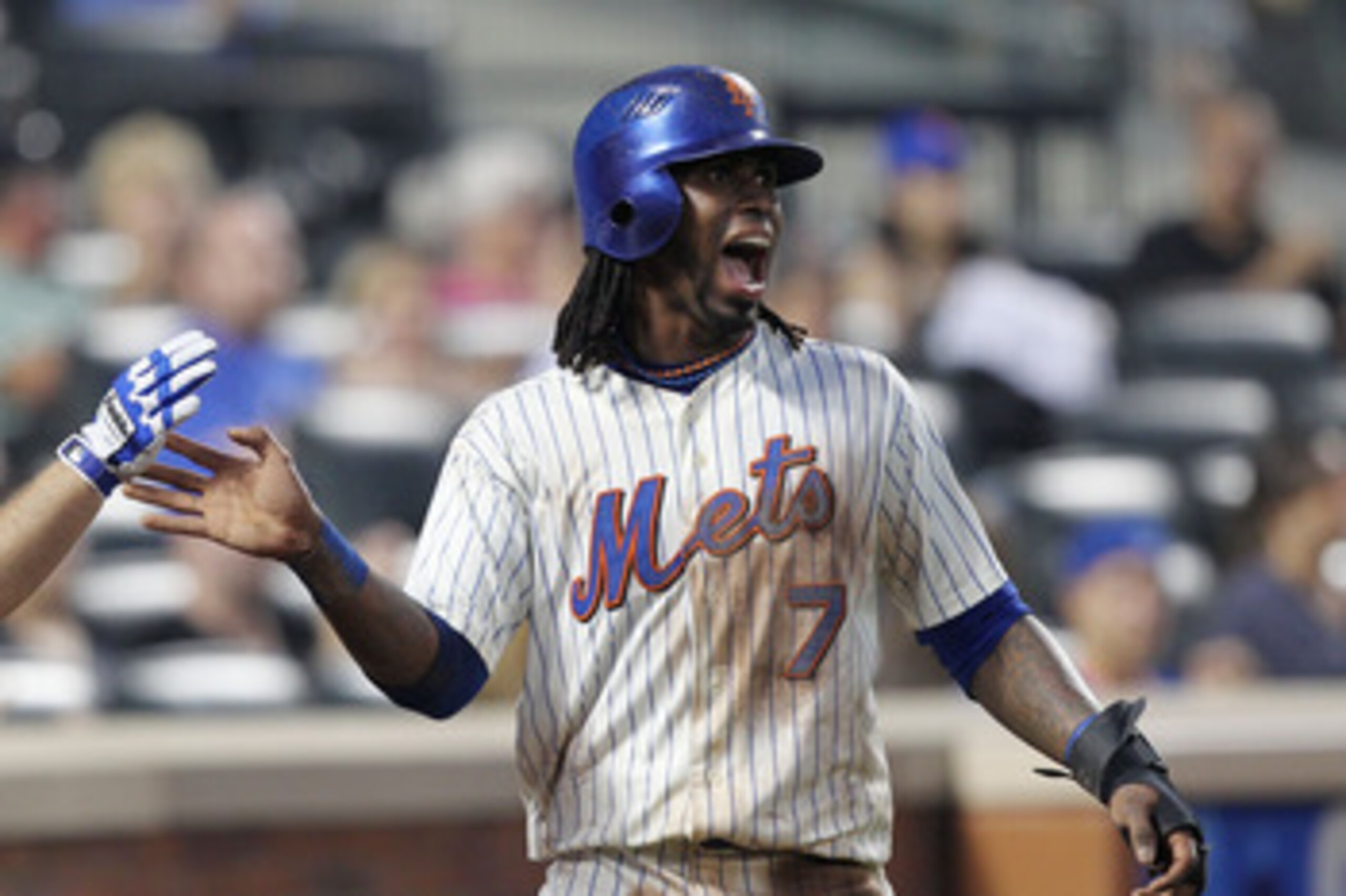 NEW YORK, NY - JUNE 18: Jose Reyes #7 of the New York Mets celebrates scoring against the Los Angeles Angels of Anaheim during their game on June 18, 2011 at Citi Field in the Flushing neighborhood of the Queens borough of New York City. (Photo by Al Be NEW YORK, NY - JUNE 18: Jose Reyes #7 of the New York Mets celebrates scoring against the Los Angeles Angels of Anaheim during their game on June 18, 2011 at Citi Field in the Flushing neighborhood of the Queens borough of New York City. (Photo by Al Be