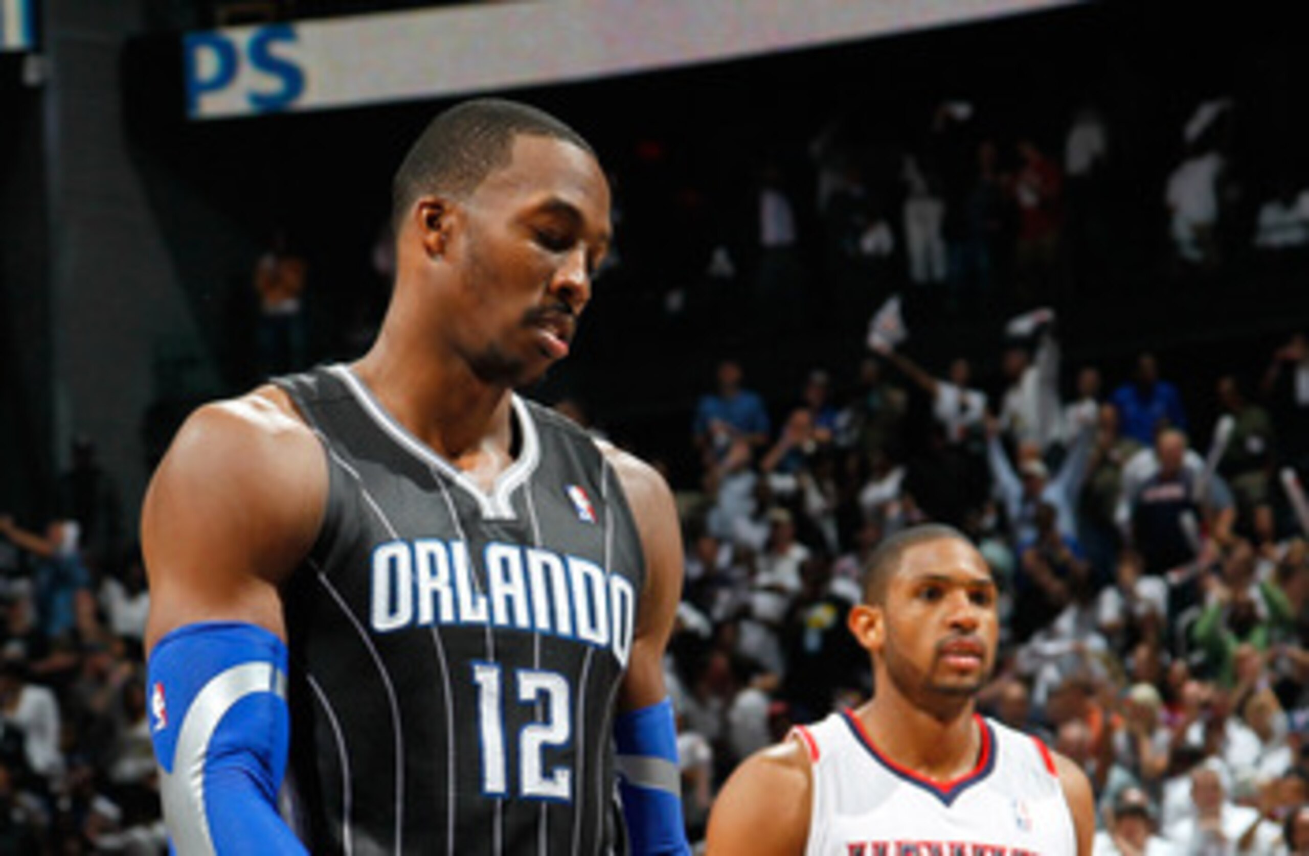 ATLANTA, GA - APRIL 28:  Dwight Howard #12 of the Orlando Magic reacts after a turnover to the Atlanta Hawks during Game Six of the Eastern Conference Quarterfinals in the 2011 NBA Playoffs at Philips Arena on April 28, 2011 in Atlanta, Georgia.  NOTE TO