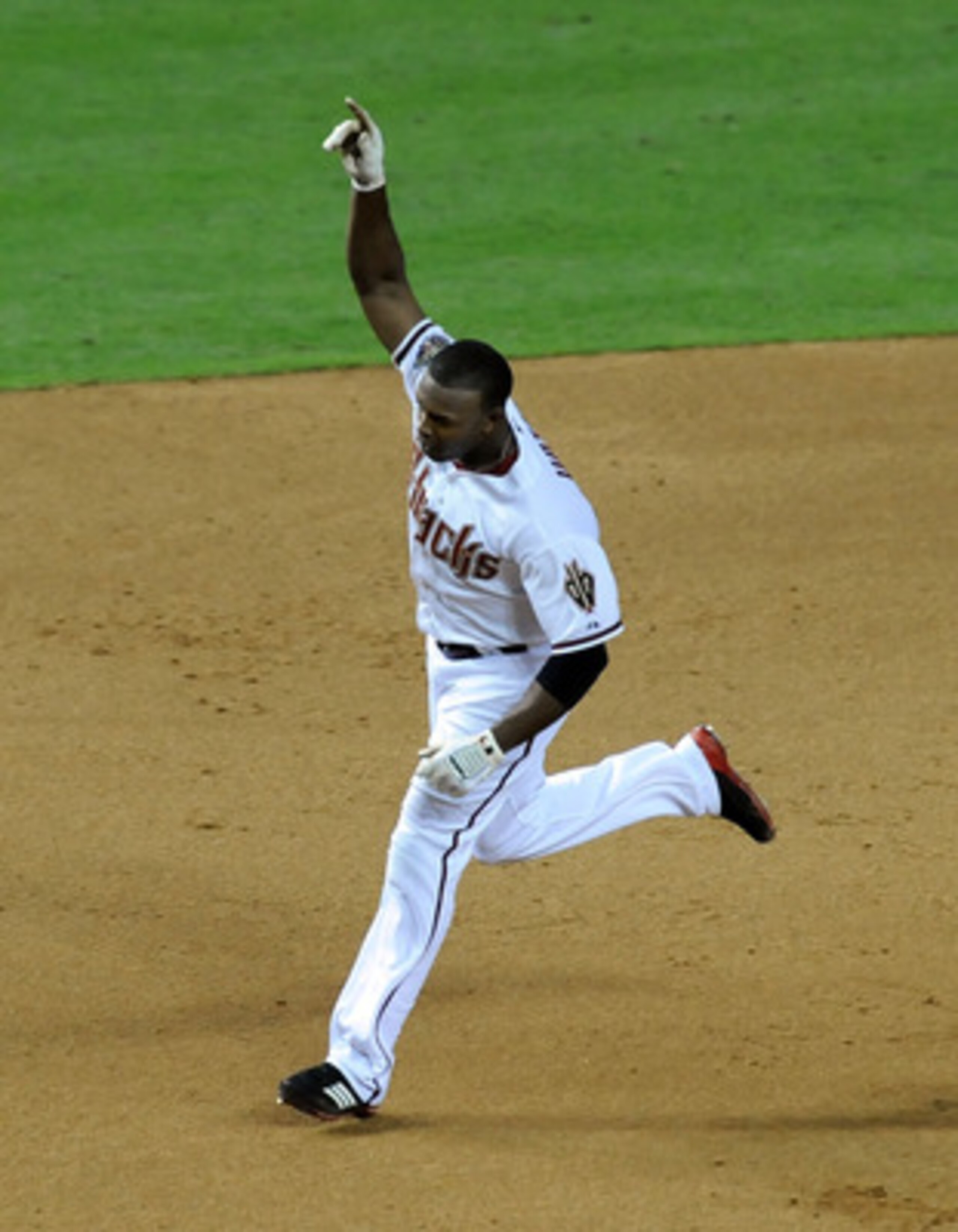 PHOENIX - JUNE 16: Justin Upton #10 of the Arizona Diamondbacks holds his hand in the air after hitting a walk off home run against the San Francisco Giants at Chase Field on June 16, 2011 in Phoenix, Arizona. (Photo by Norm Hall/Getty Images) PHOENIX - JUNE 16: Justin Upton #10 of the Arizona Diamondbacks holds his hand in the air after hitting a walk off home run against the San Francisco Giants at Chase Field on June 16, 2011 in Phoenix, Arizona. (Photo by Norm Hall/Getty Images)