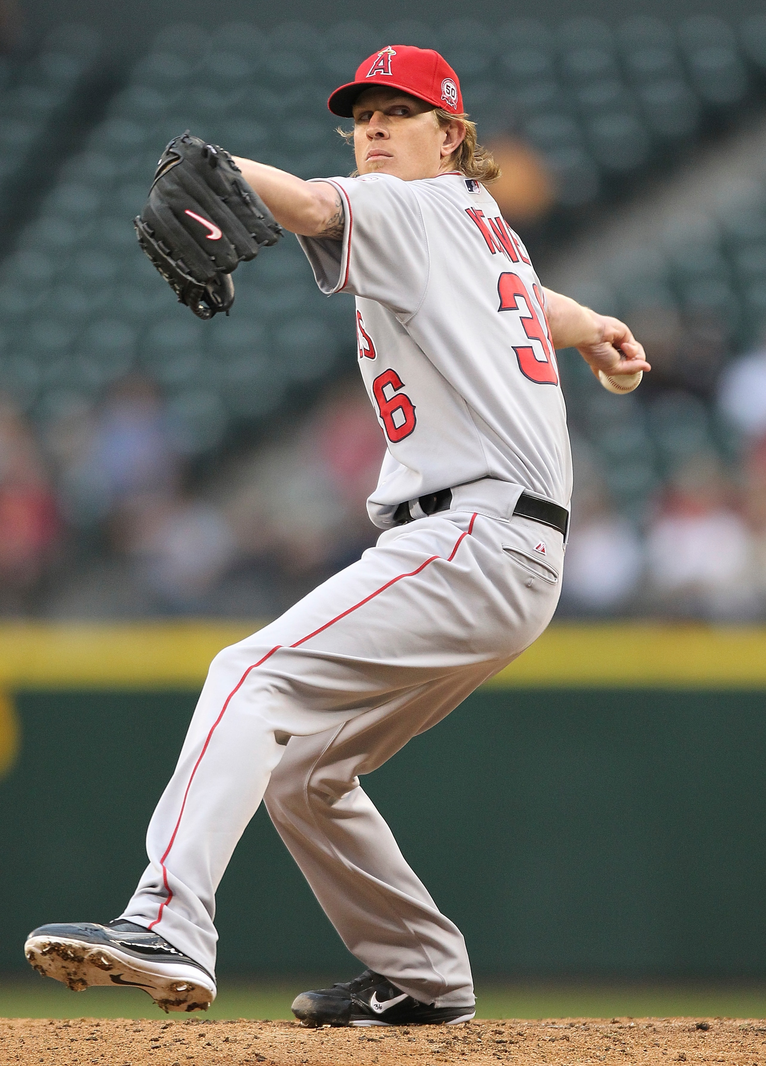 SEATTLE - JUNE 14:  Starting pitcher Jered Weaver #36 of the Los Angeles Angels of Anaheim pitches against the Seattle Mariners at Safeco Field on June 14, 2011 in Seattle, Washington. (Photo by Otto Greule Jr/Getty Images)