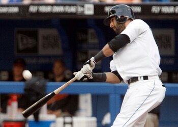 TORONTO, CANADA - JUNE 15:  Jose Bautista #19 of the Toronto Blue Jays hits during MLB action against the Baltimore Orioles at The Rogers Centre June 15, 2011 in Toronto, Ontario, Canada. (Photo by Abelimages/Getty Images)