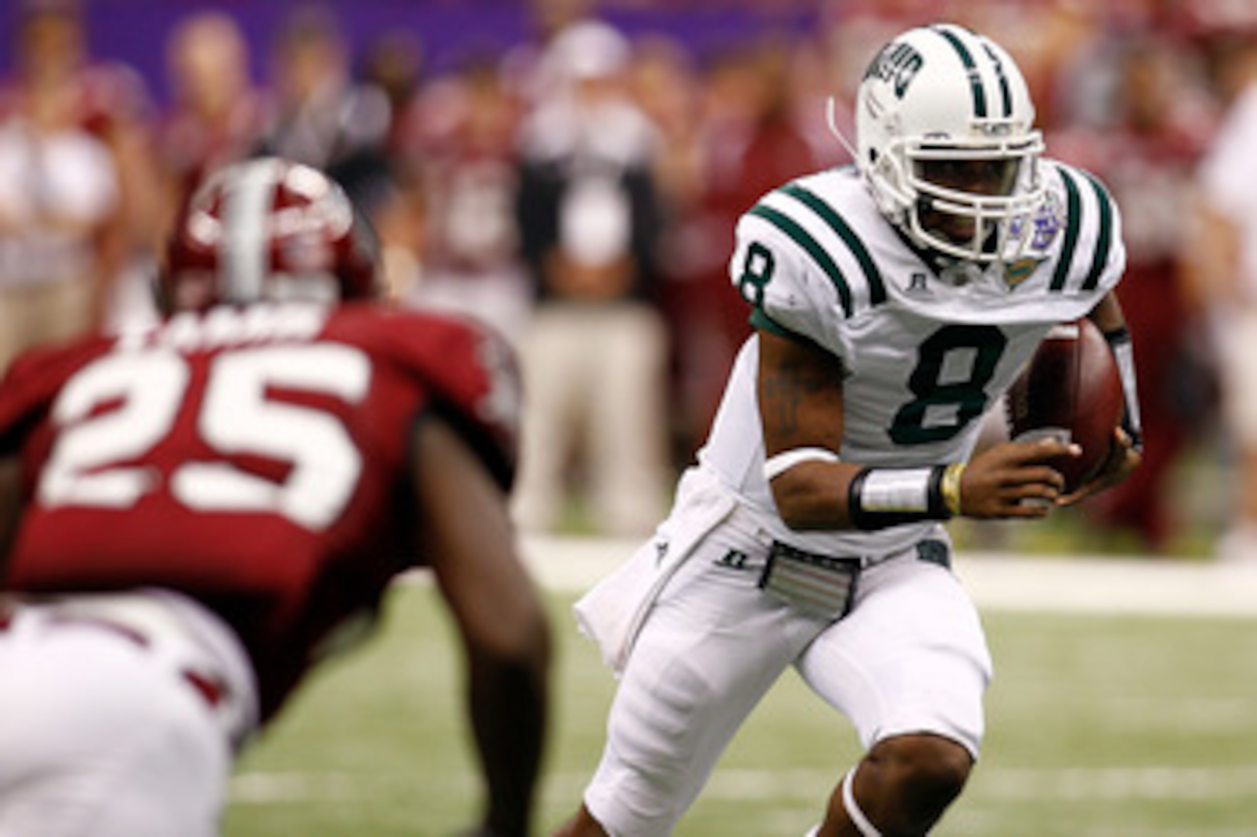 NEW ORLEANS, LA - DECEMBER 18:  Quarterback Boo Jackson #8 of the Ohio University Bobcats runs with the ball during the game against the Troy University Trojans  during the R&L Carriers New Orleans Bowl at the Louisiana Superdome on December 18, 2010 in N
