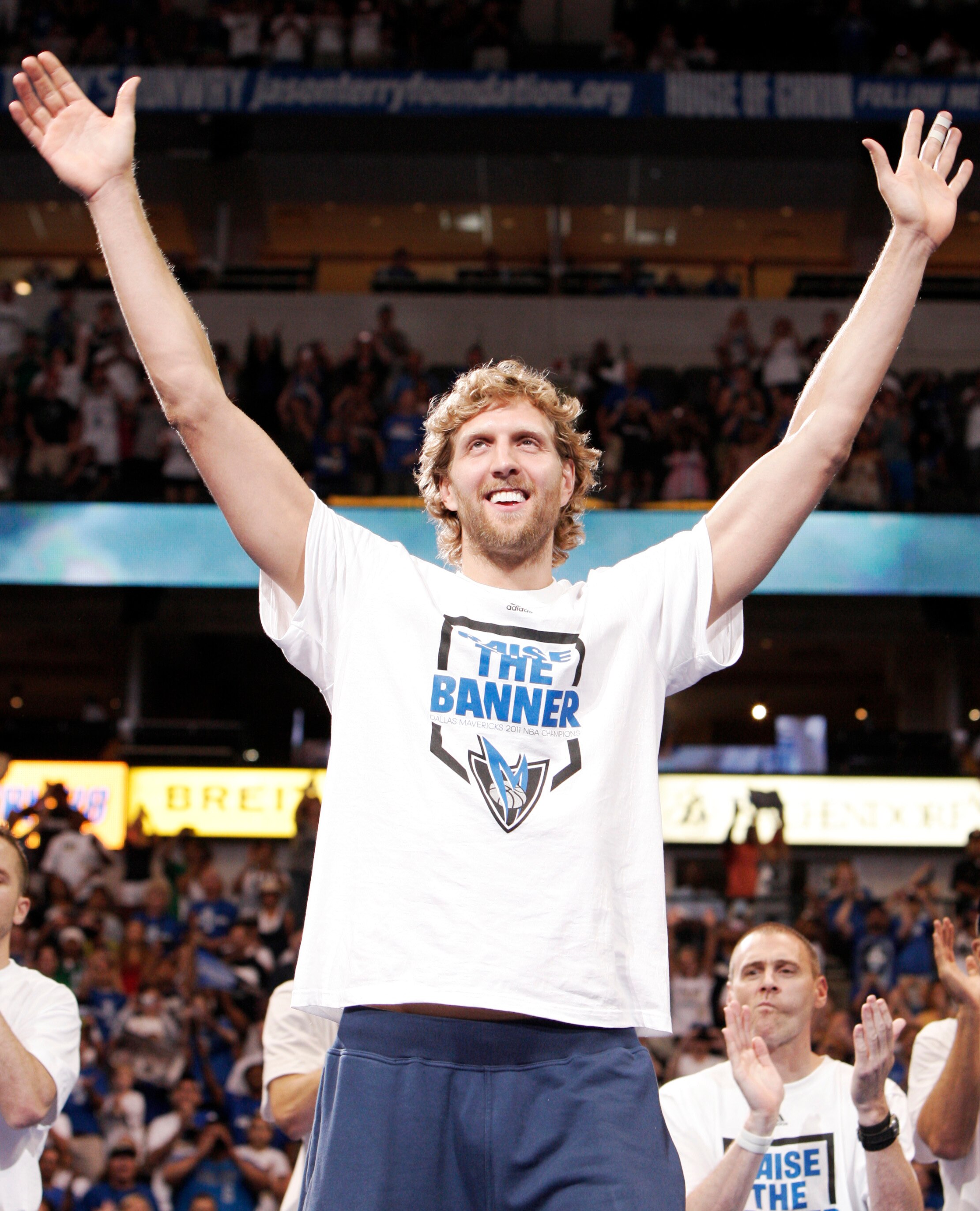 DALLAS, TX - JUNE 16: Forward Dirk Nowitzki of the Dallas Mavericks waves to fans during the Dallas Mavericks Victory celebration on June 16, 2011 in Dallas, Texas. (Photo by Brandon Wade/Getty Images)