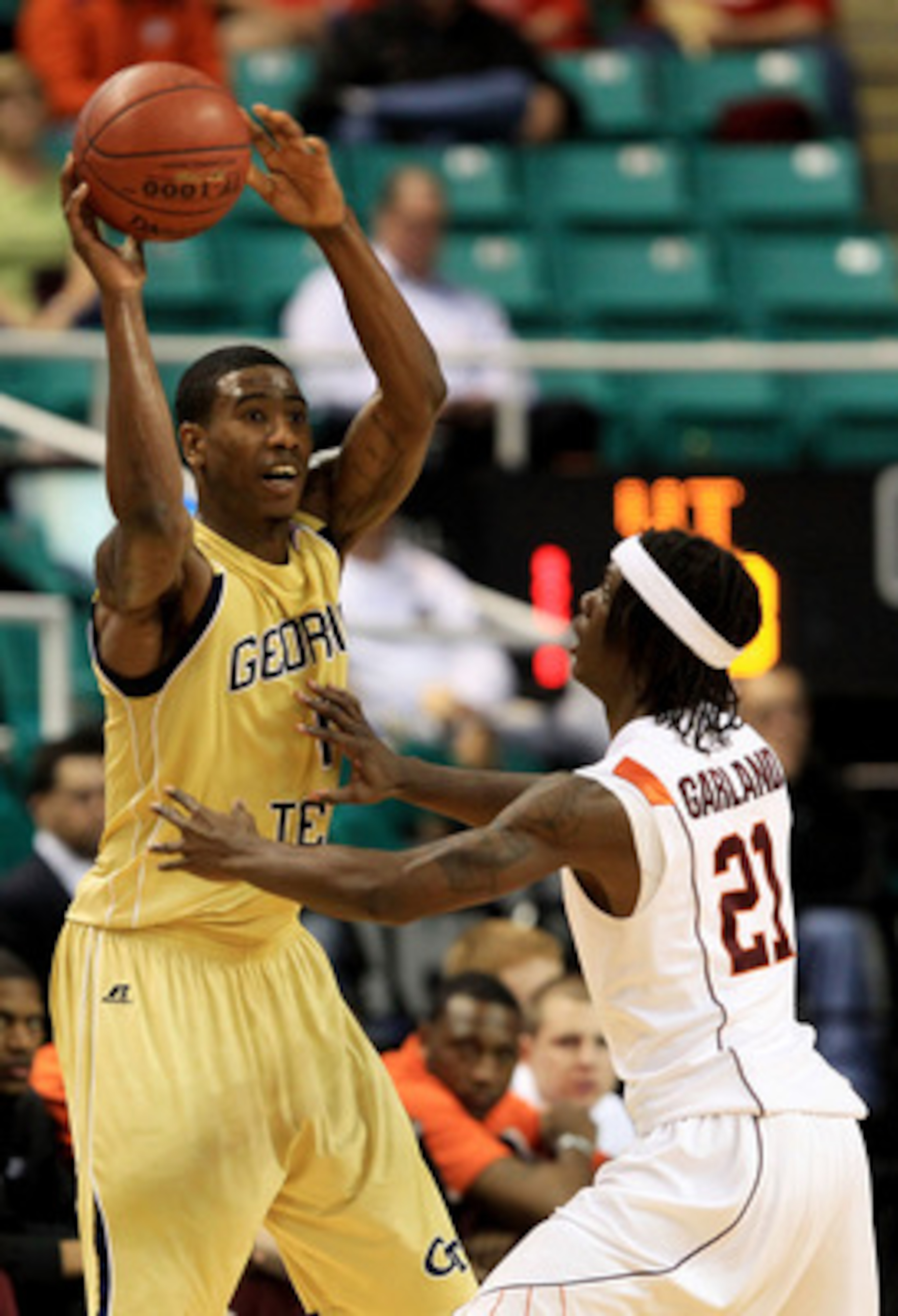 GREENSBORO, NC - MARCH 10: Iman Shumpert #1 of the Georgia Tech Yellow Jackets looks to pass against Tyrone Garland #21 of the Virginia Tech Hokies during the first half of the game in the first round of the 2011 ACC men's basketball tournament at the Gr GREENSBORO, NC - MARCH 10: Iman Shumpert #1 of the Georgia Tech Yellow Jackets looks to pass against Tyrone Garland #21 of the Virginia Tech Hokies during the first half of the game in the first round of the 2011 ACC men's basketball tournament at the Gr